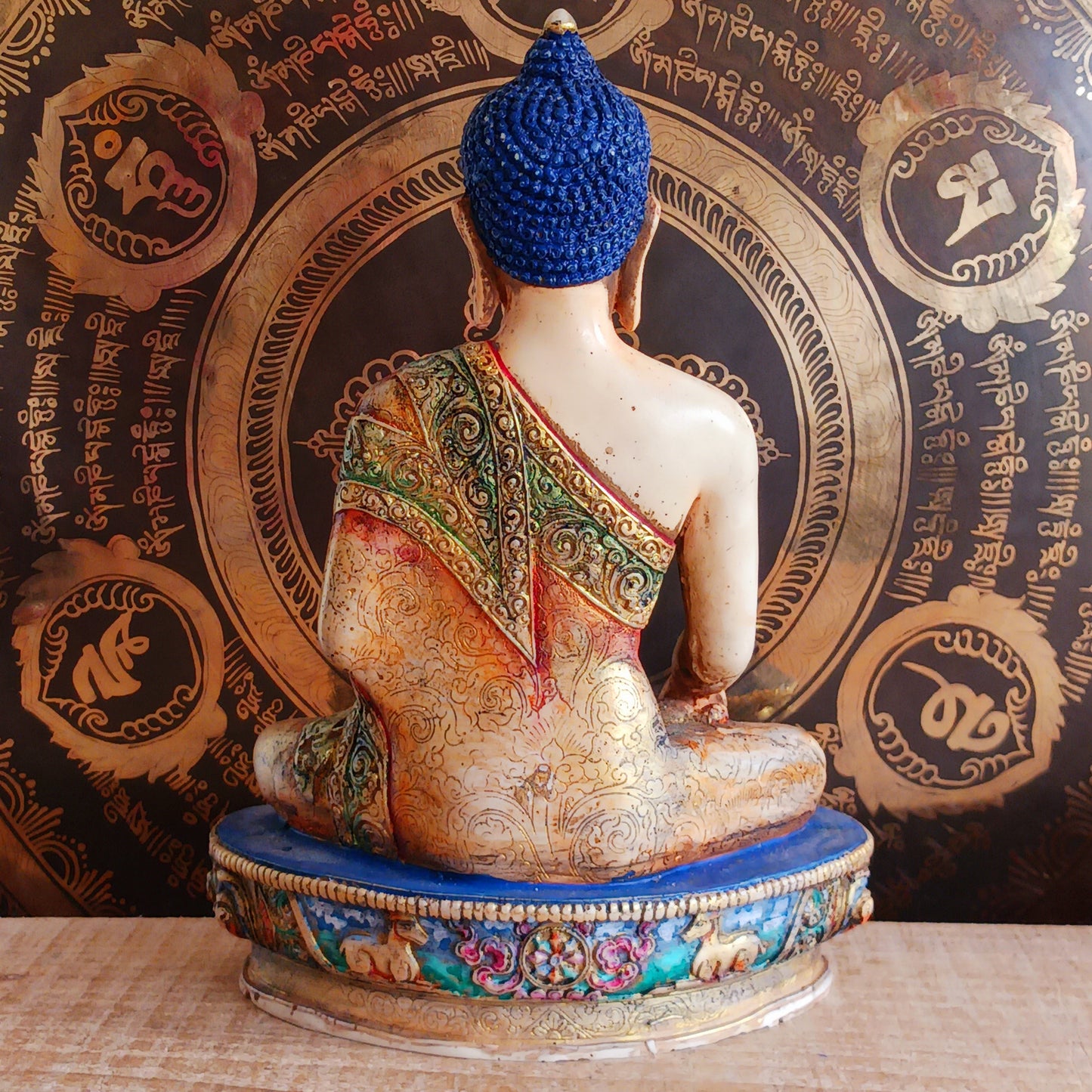 This exquisite Shakyamuni Buddha statue is crafted from a blend of clay and resin, then hand-painted by skilled artisans in Nepal. Using traditional thangka colours, each piece is meticulously detailed to match the authentic representations of Shakyamuni Buddha. The traditional painting process reflects deep spiritual symbolism, making this statue not only a beautiful decorative item but also a meaningful spiritual artifact. Perfect for your altar, meditation space, or as a unique cultural gift.