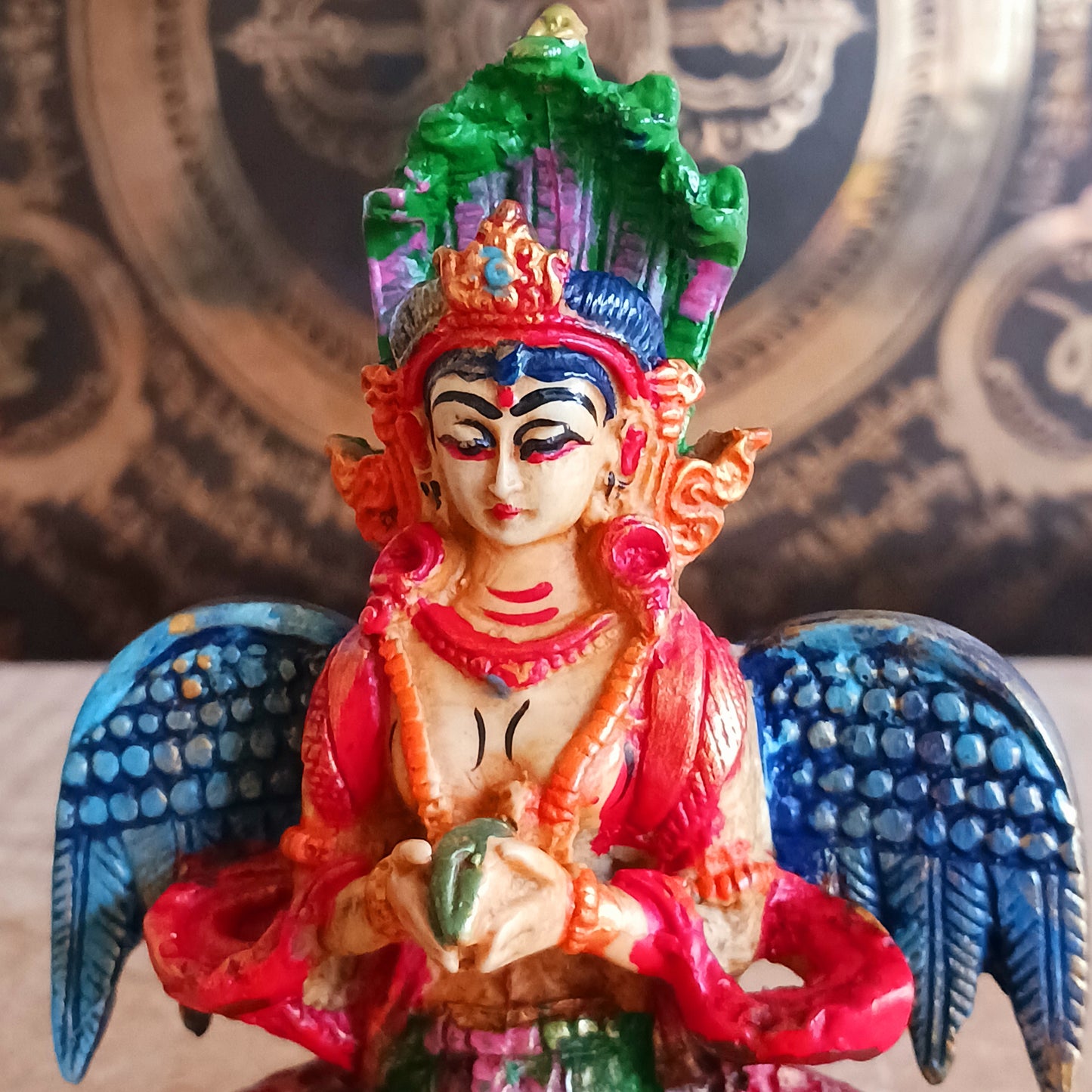Bring home the mystical charm of the Naga Kanya with this handpainted statue, crafted in vibrant, eye-catching colours. Known as the “Snake of the Rainbow” or the daughter of the serpent, Naga Kanya is revered as a benevolent goddess who protects treasures and guides devotees across the three realms.