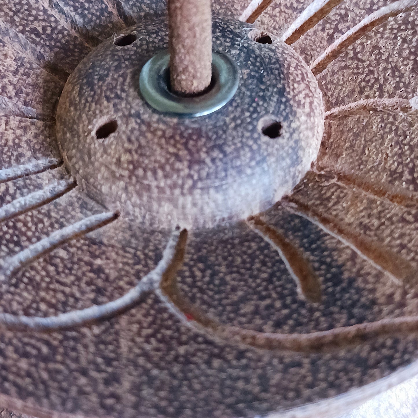 Hand-carved with reverence and skill, this Lotus Flower Incense Holder is made from a single piece of Nepalese wood. Its elegant lotus flower design symbolizes the blossoming of inner peace through mindful living.