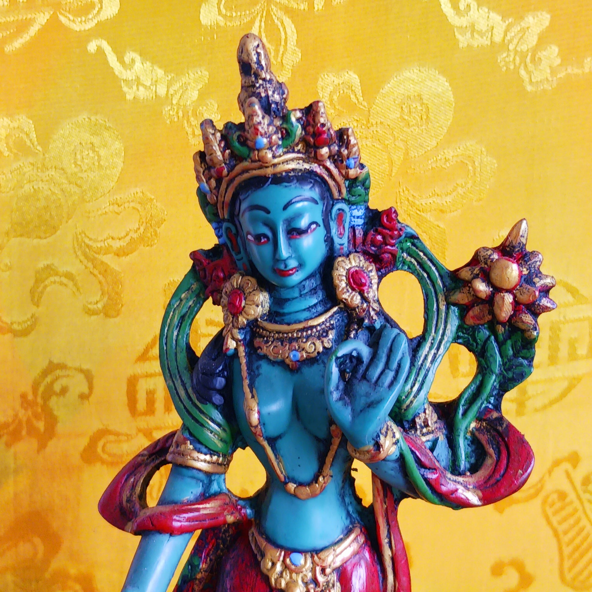 Bring sacred presence and compassionate energy into your space with this beautifully hand-painted resin statue of Green Tara, the revered bodhisattva of compassion and wisdom. One of the 21 manifestations of Tara, she is depicted here standing gracefully with her hands in the varada mudra, the gesture of generosity and blessing.