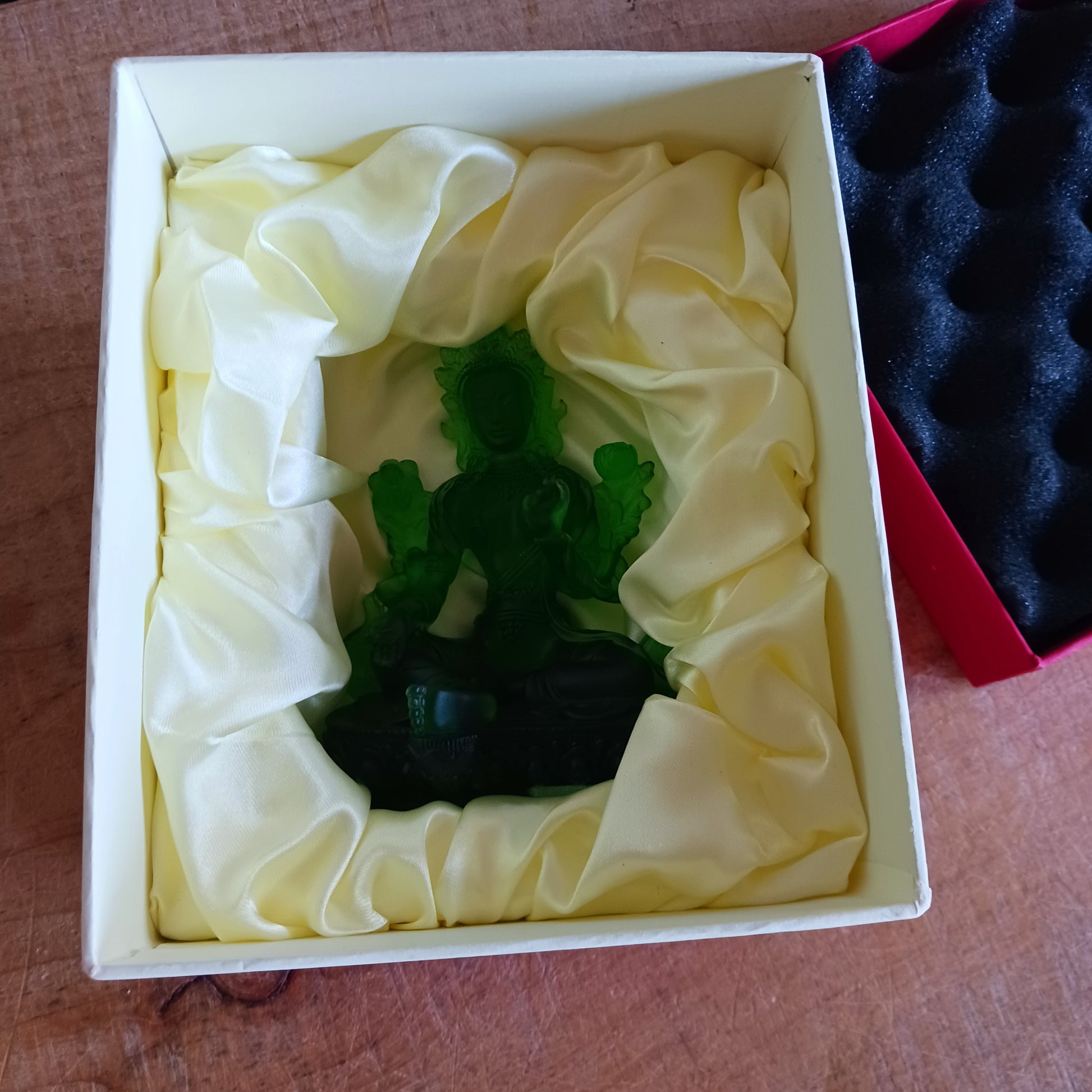 Bring serenity and divine feminine energy into your space with this stunning transparent Green Tara statue, crafted from high-quality glazed glass. Known as the "Mother of all Mothers," Green Tara represents compassion in action. Her graceful posture—one leg extended—symbolizes her readiness to help all beings instantly.