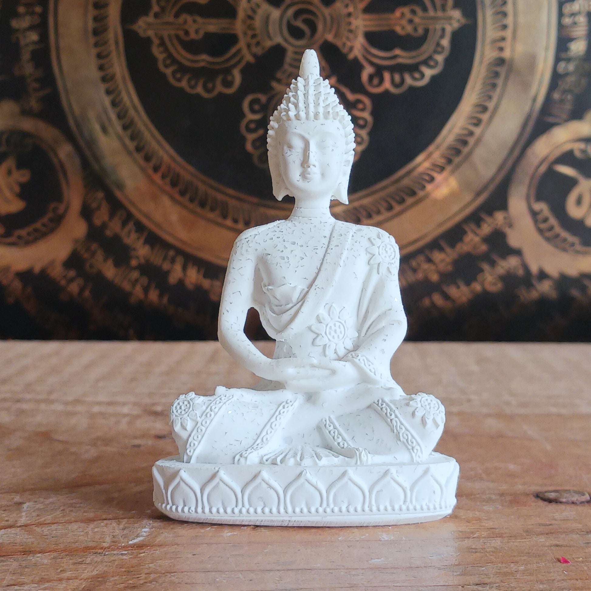This small white serene Buddha statue is with meditation mudra. &nbsp;Bring peace and calm to your space with this elegant little Buddha statue. Crafted with attention to detail, this serene figurine features the Buddha in a traditional meditation mudra, symbolizing inner peace,