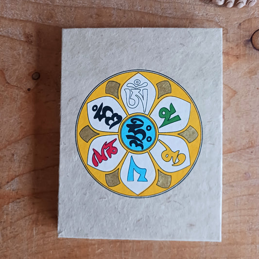 Discover the beauty of traditional craftsmanship with our Handmade Om Mani Notebooks. Each notebook features a durable hard-back cotton cover adorned with the sacred Om Mani design, symbolising wisdom and compassion.