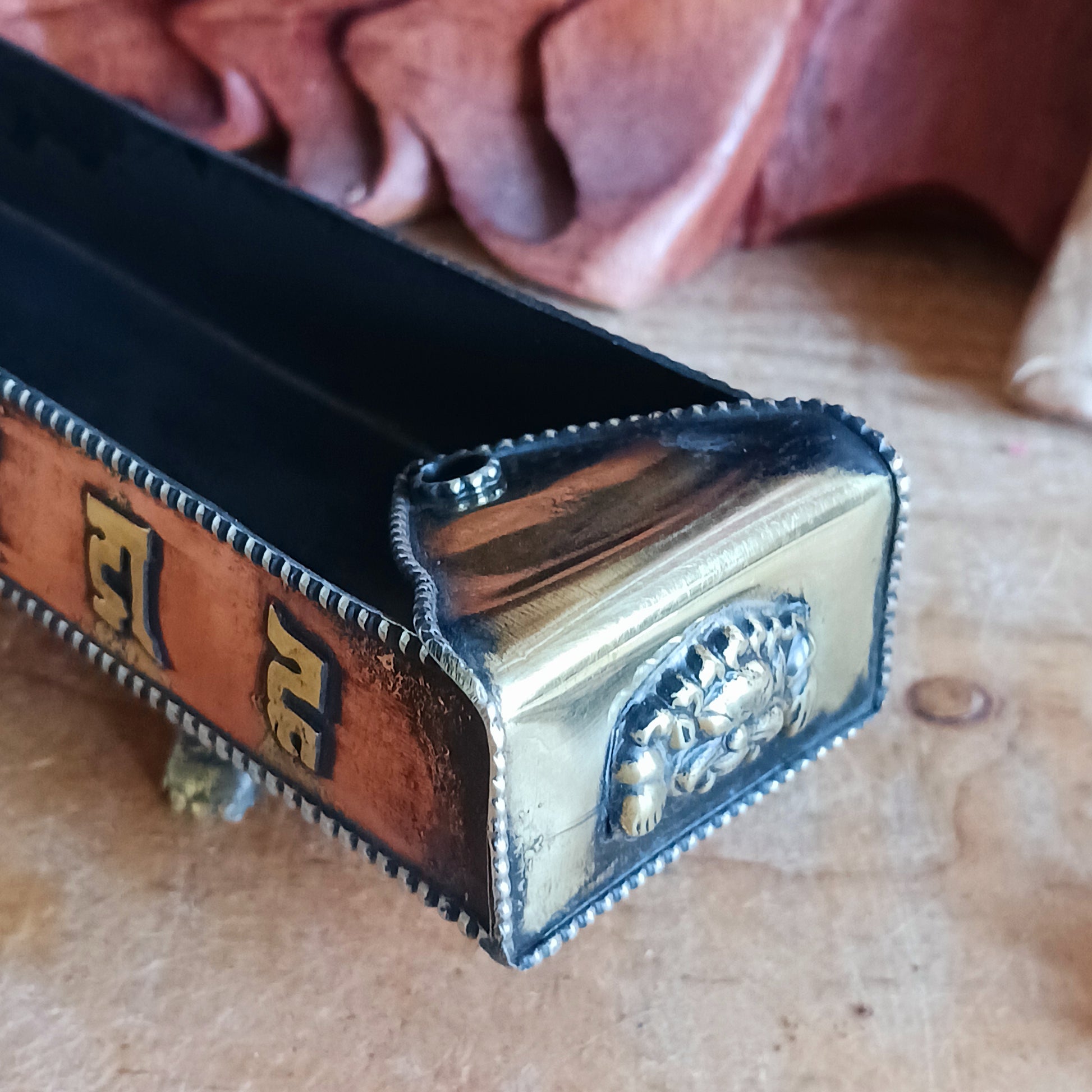 Elevate your sacred space with this traditional copper and brass incense burner, crafted with authentic Tibetan design elements. Supported by small raised feet, it provides excellent airflow for clean, even burning.