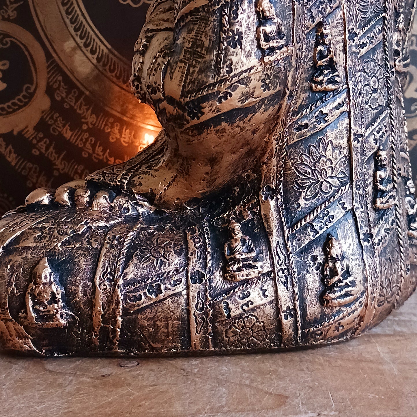 Bring a sense of calm and harmony to any space with this stunning Gold Effect Thai Buddha Tealight Holder. Crafted with beautiful detailing, this serene Buddha sits in a peaceful meditating pose while gently cradling a space for a tealight.