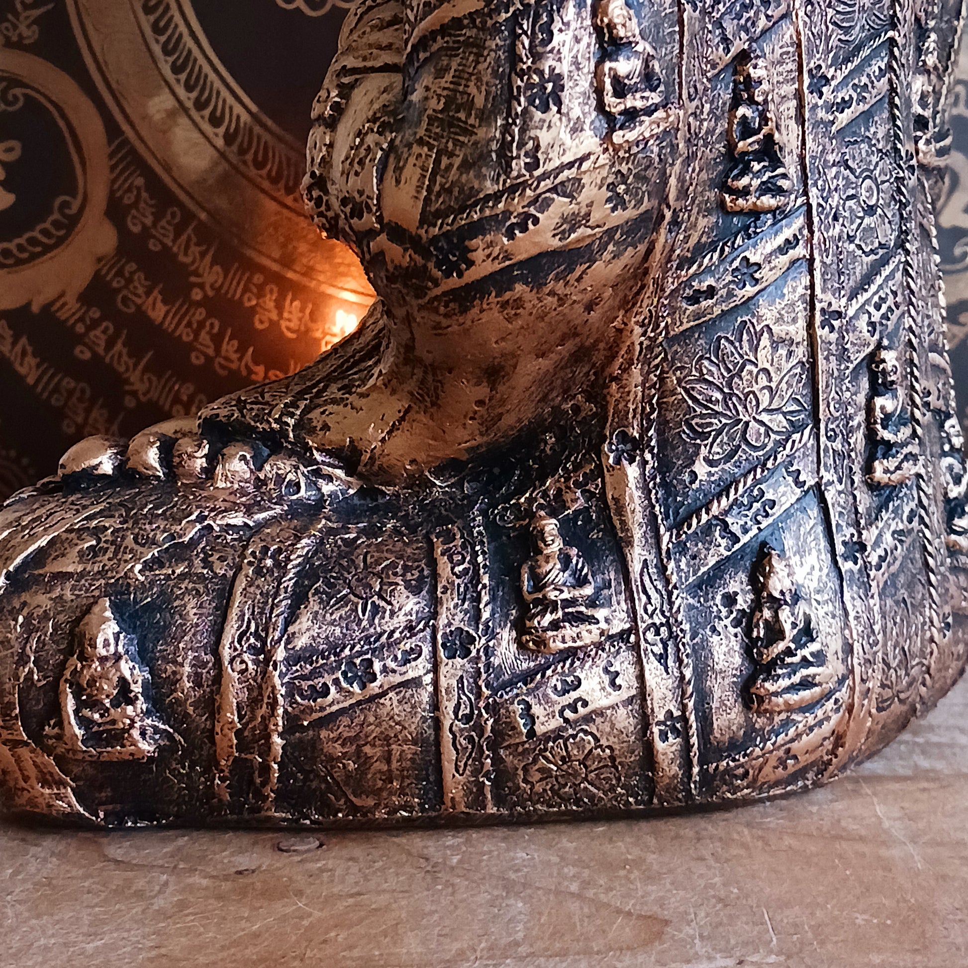 Bring a sense of calm and harmony to any space with this stunning Gold Effect Thai Buddha Tealight Holder. Crafted with beautiful detailing, this serene Buddha sits in a peaceful meditating pose while gently cradling a space for a tealight.