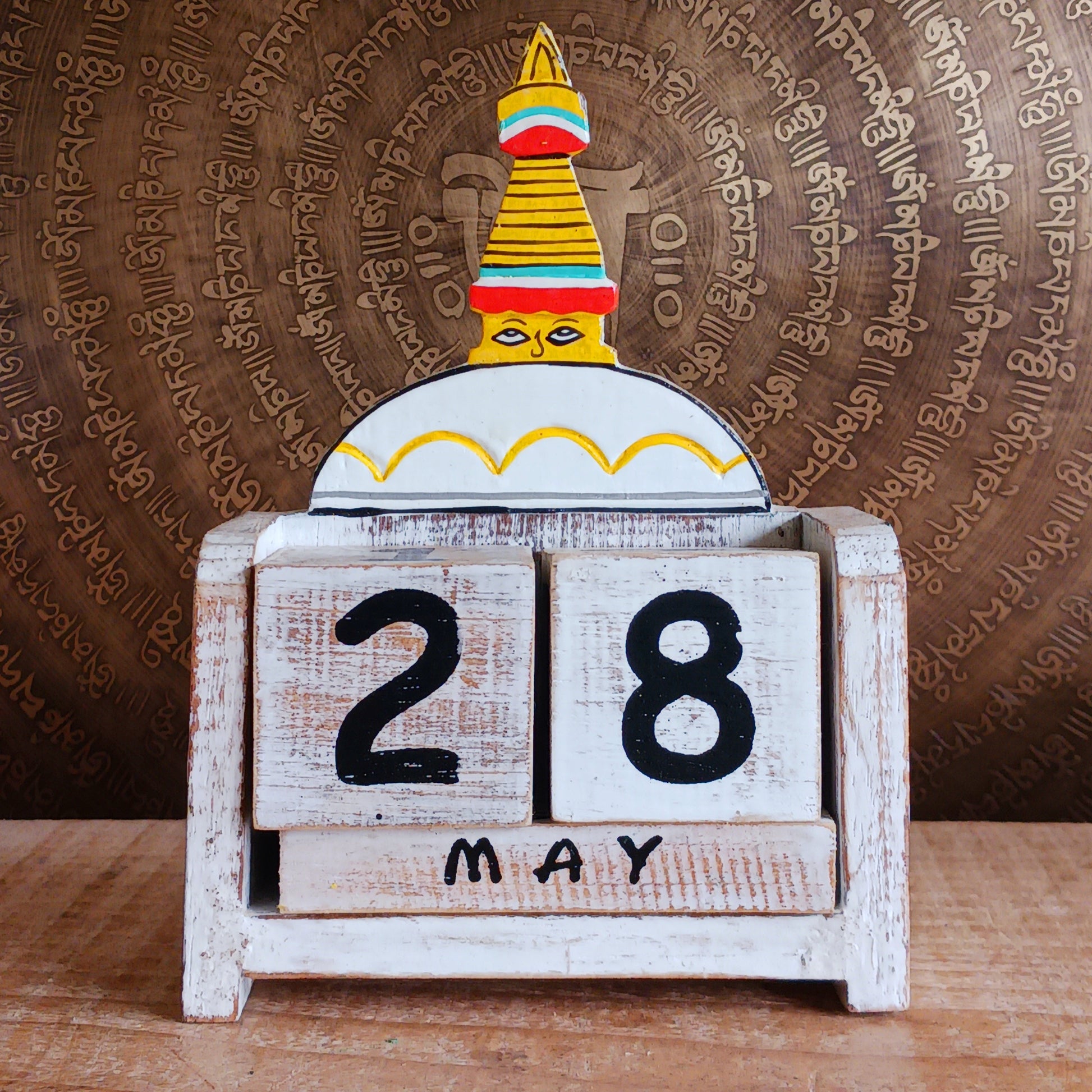 This handcrafted wooden Tibetan Stupa block calendar is perfect for your work or study space and makes a great desk-buddy too. Just rotate the wooden blocks each day and use year after year.