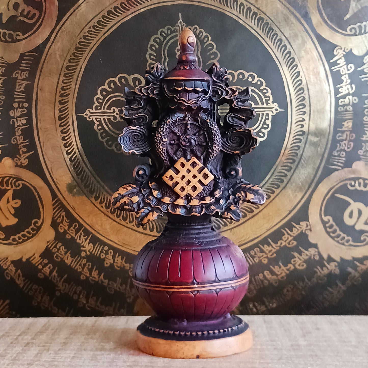 Invite harmony, abundance, and spiritual protection into your space with this hand-finished Tibetan Treasure Vase. Traditionally revered in Tibetan Buddhism, the Treasure Vase represents health, longevity, wealth, prosperity, wisdom, and the vast potential of space.