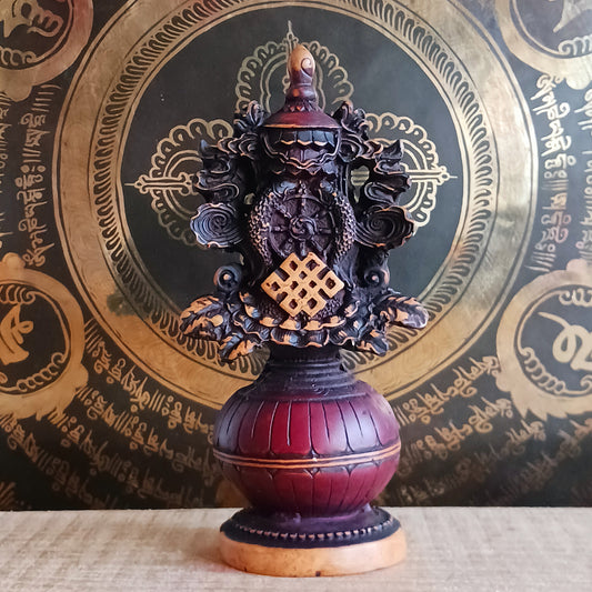 Invite harmony, abundance, and spiritual protection into your space with this hand-finished Tibetan Treasure Vase. Traditionally revered in Tibetan Buddhism, the Treasure Vase represents health, longevity, wealth, prosperity, wisdom, and the vast potential of space.