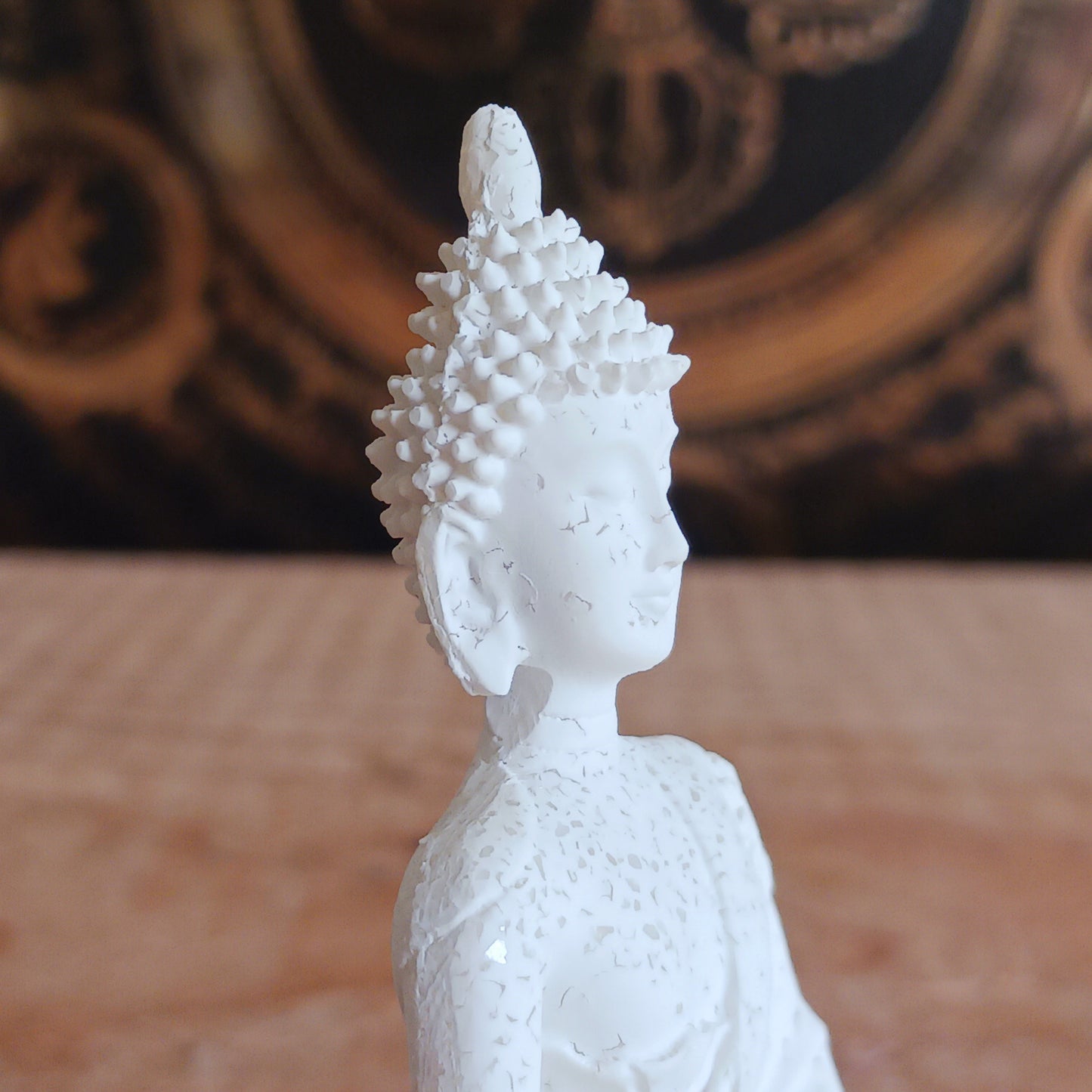 This small white serene Buddha statue is with meditation mudra. &nbsp;Bring peace and calm to your space with this elegant little Buddha statue. Crafted with attention to detail, this serene figurine features the Buddha in a traditional meditation mudra, symbolizing inner peace,