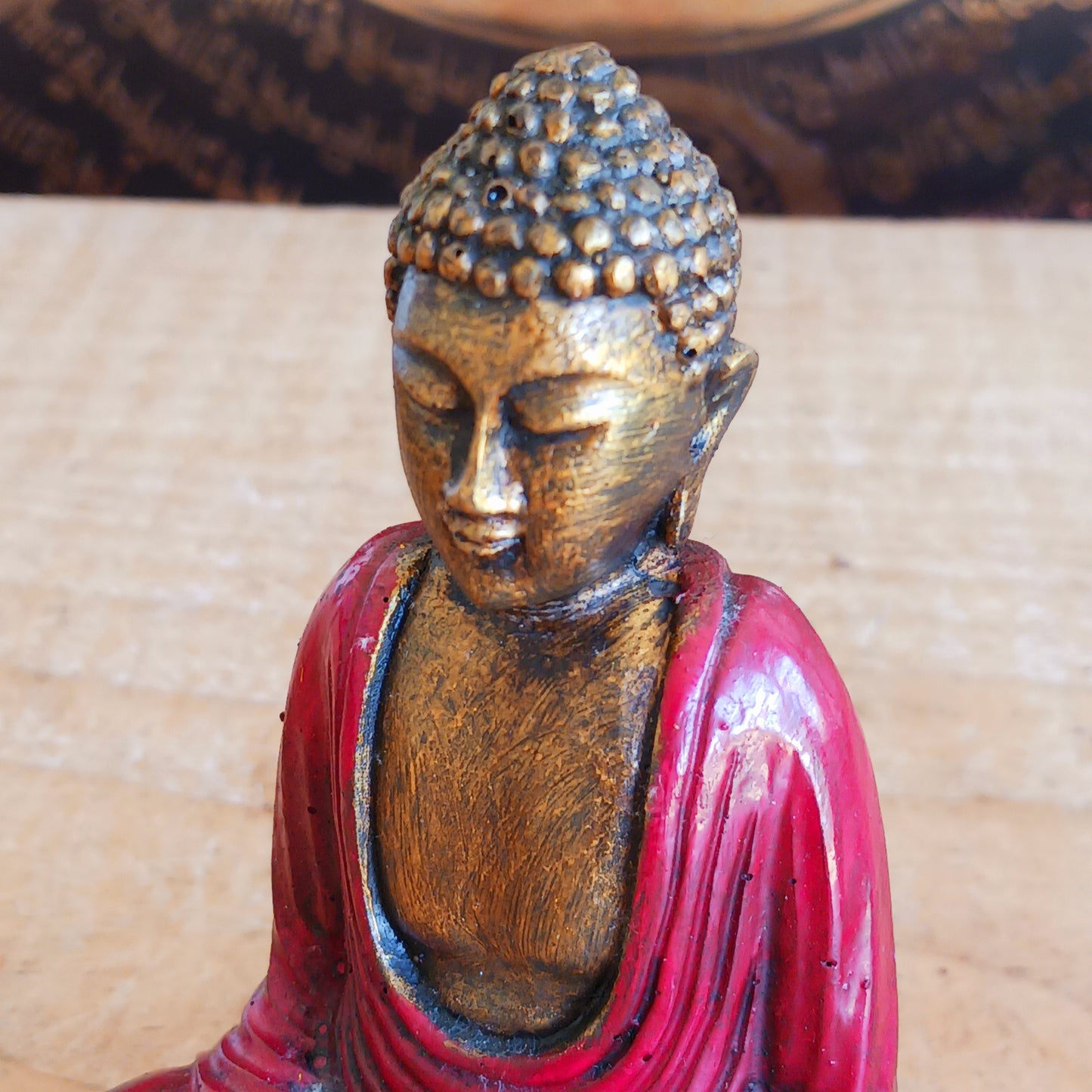 Create a calming and uplifting atmosphere with this beautiful little Red & Gold Buddha Statue. Designed to inspire peace, harmony, and positive energy, this charming decorative ornament makes a wonderful addition to any home, office, meditation room, or yoga space.