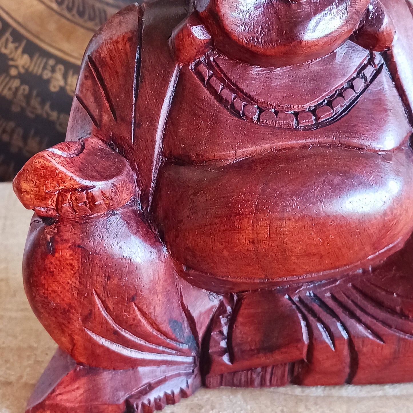 Bring joy and good fortune into your space with this exquisite hand-carved Laughing Buddha statue. Known as Budai in Chinese culture, this beloved figure represents contentment, abundance, and spiritual well-being.