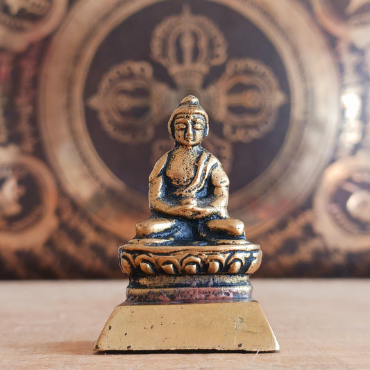 Crafted in Nepal through Fairtrade artisans, this small Buddha incense holder brings a sense of peace and mindfulness to any sacred space. Made from finely detailed brass, the seated Buddha design represents calm, wisdom, and spiritual balance. 