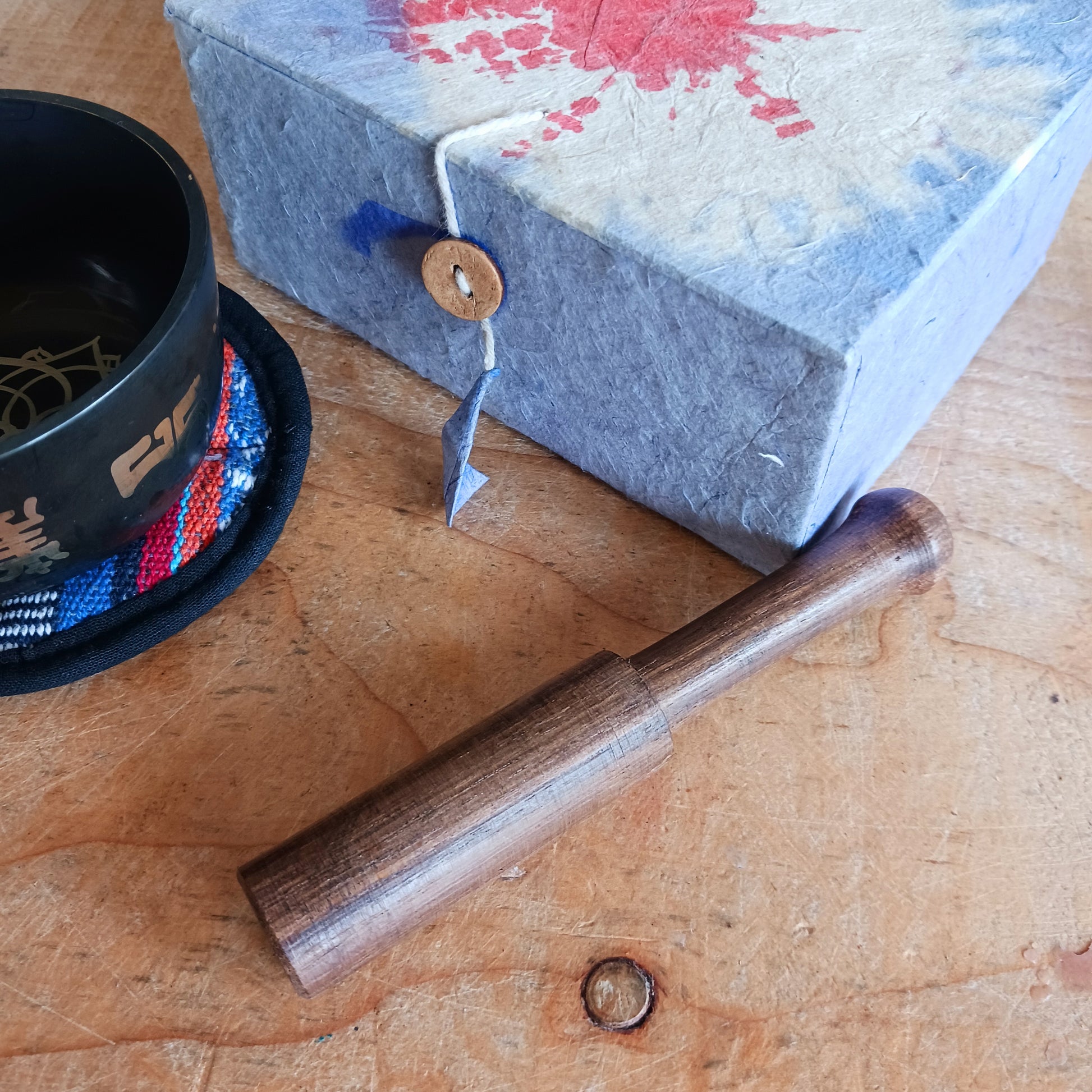 Embark on your sound healing journey with this medium-sized black Tibetan singing bowl set, ideal for beginners and spiritual seekers alike. Crafted with precision and a machine-made polished finish, this singing bowl produces steady, resonant tones that are perfect for meditation, energy healing, and Tibetan Buddhist practices.