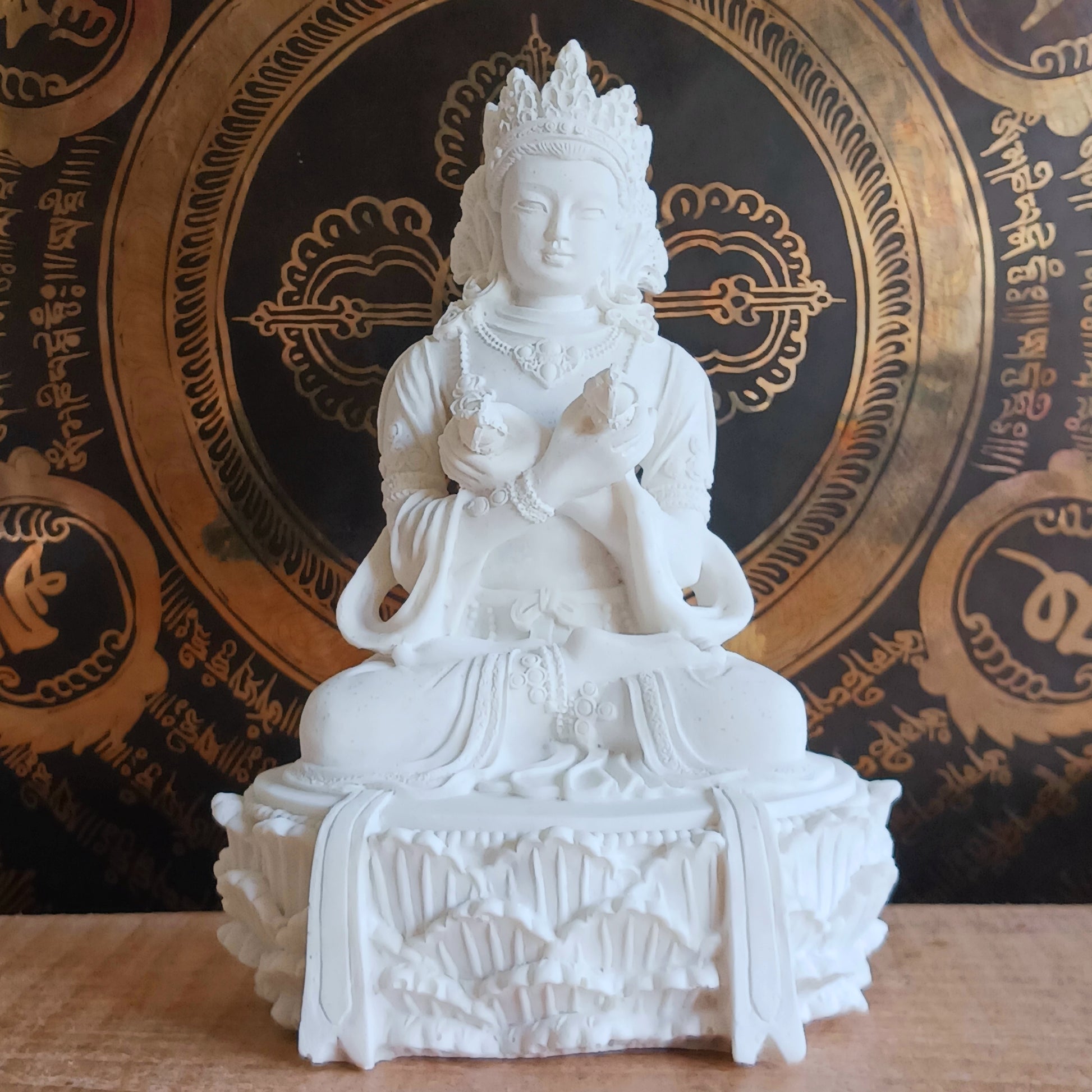Bring harmony, wisdom, and spiritual balance into your space with this White Tara Statue with Bell &amp; Dorje. A cherished symbol in Buddhist tradition, White Tara represents purity, compassion, and enlightened energy.