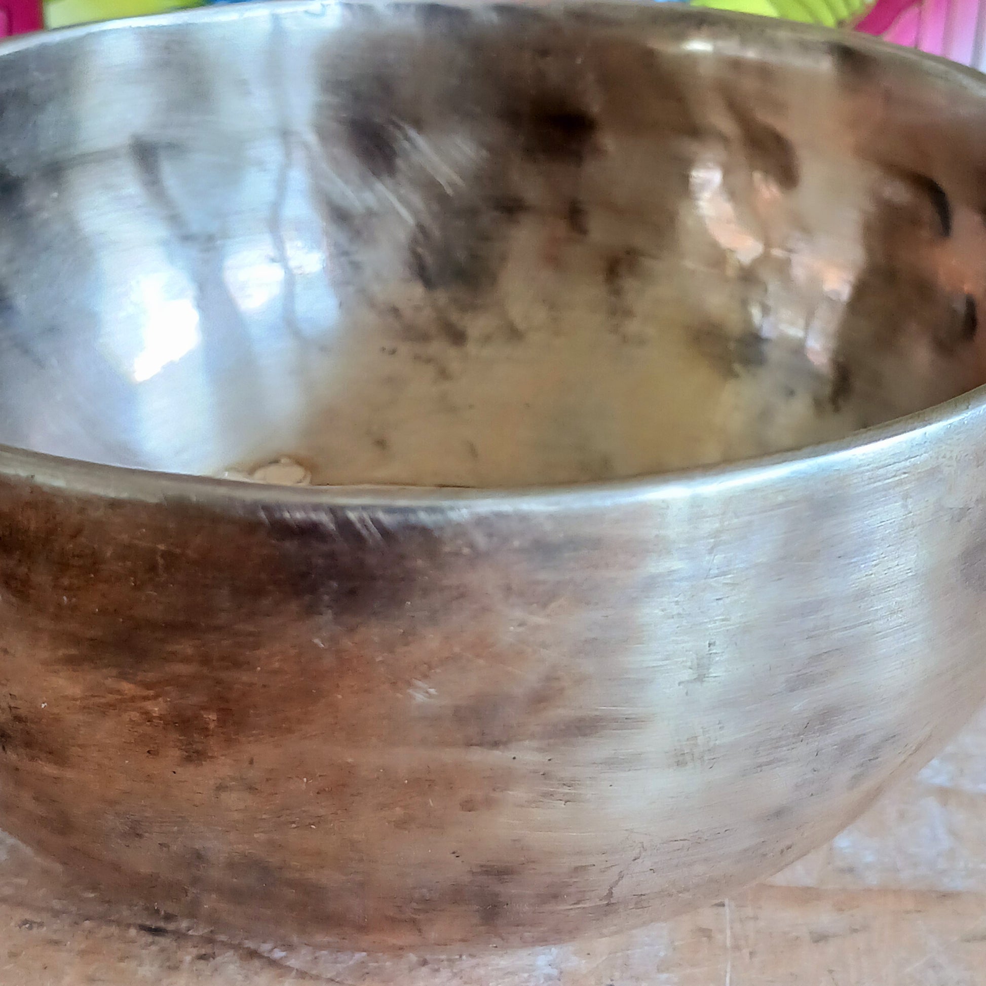 Elevate your spiritual practice with this unique, hand-beaten singing bowl, featuring a stunning Green Tara engraving inside the bowl. Known as the goddess of compassion and action, Green Tara is a powerful symbol in Tibetan Buddhism, bringing calm, protection, and clarity to your space. This bowl produces rich, resonant tones perfect for meditation, sound healing, or sacred decor.