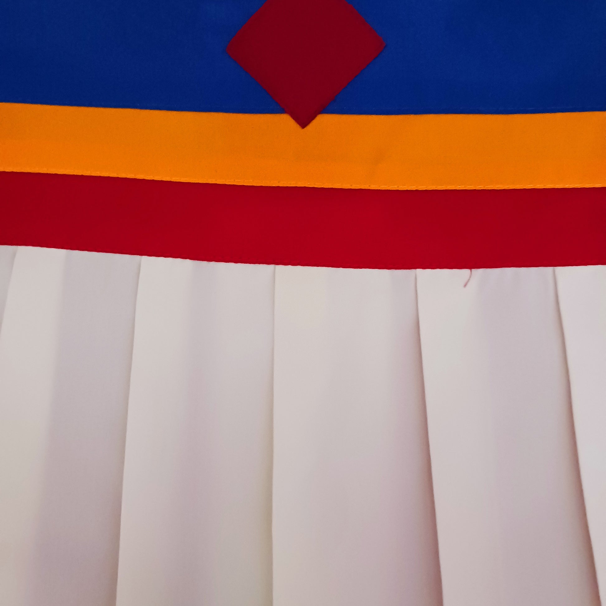 Bring spiritual harmony and traditional Himalayan craftsmanship into your home with this handmade Tibetan Buddhist Endless Knot Door Curtain. Crafted in a rich maroon fabric, this semi-transparent curtain allows natural light to pass through, creating a warm and calming atmosphere.