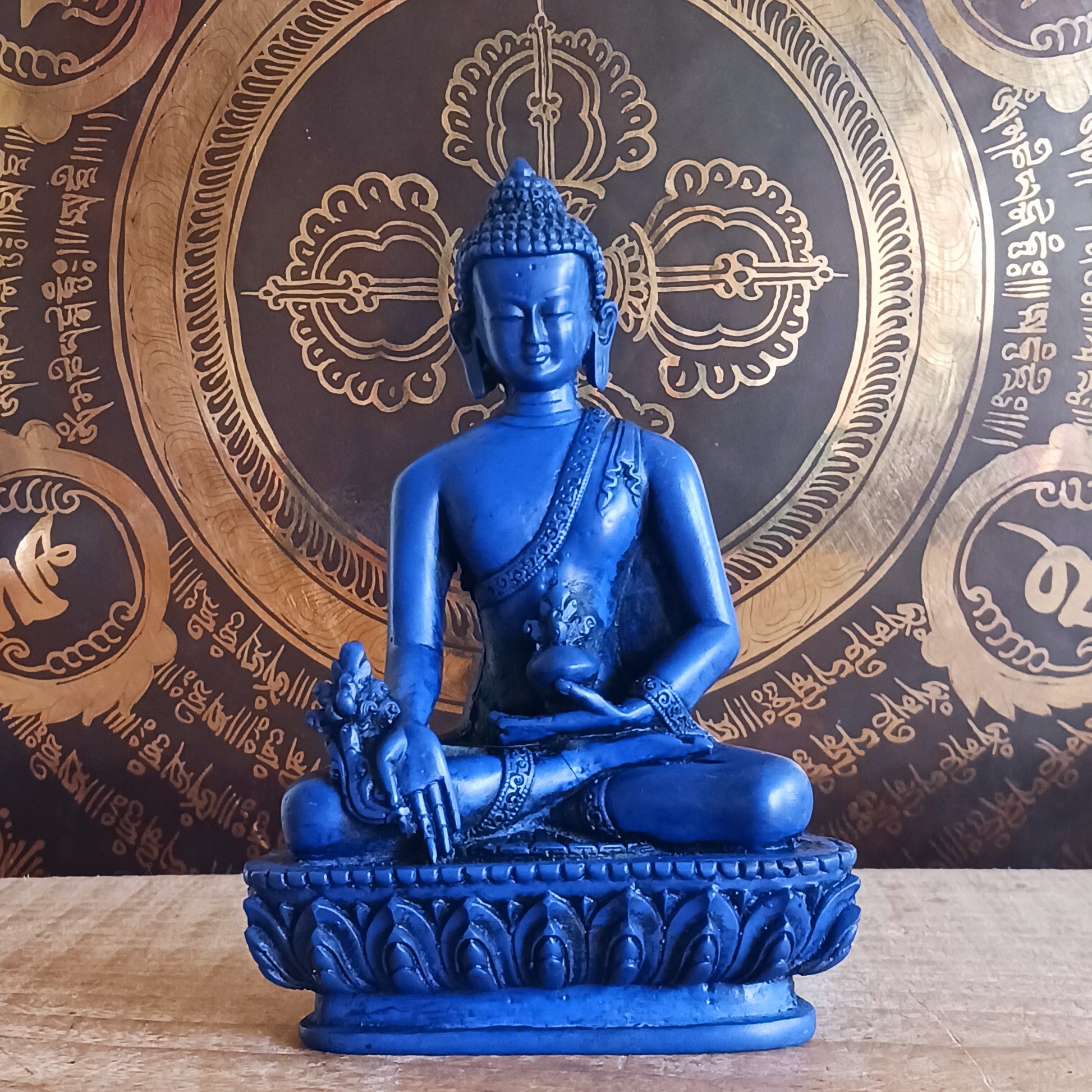 Invite peace, healing, and spiritual balance into your space with this stunning Medicine Buddha (Bhaiṣajyaguru) statue, cast in a radiant, vibrant blue. Revered throughout Mahayana Buddhist traditions, especially in Tibet and East Asia, the Medicine Buddha embodies the power to alleviate physical, emotional, and spiritual suffering.
