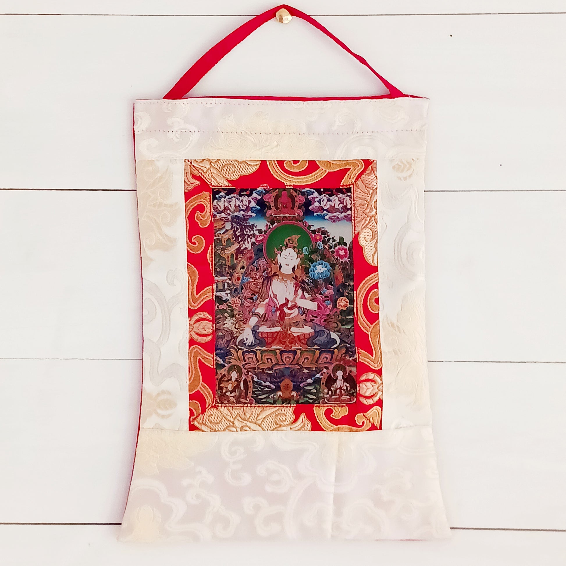 Beautiful small thangka of White Tara with silk brocade. Symbol of purity, compassion & longevity. Ideal for meditation, altar, or spiritual décor.