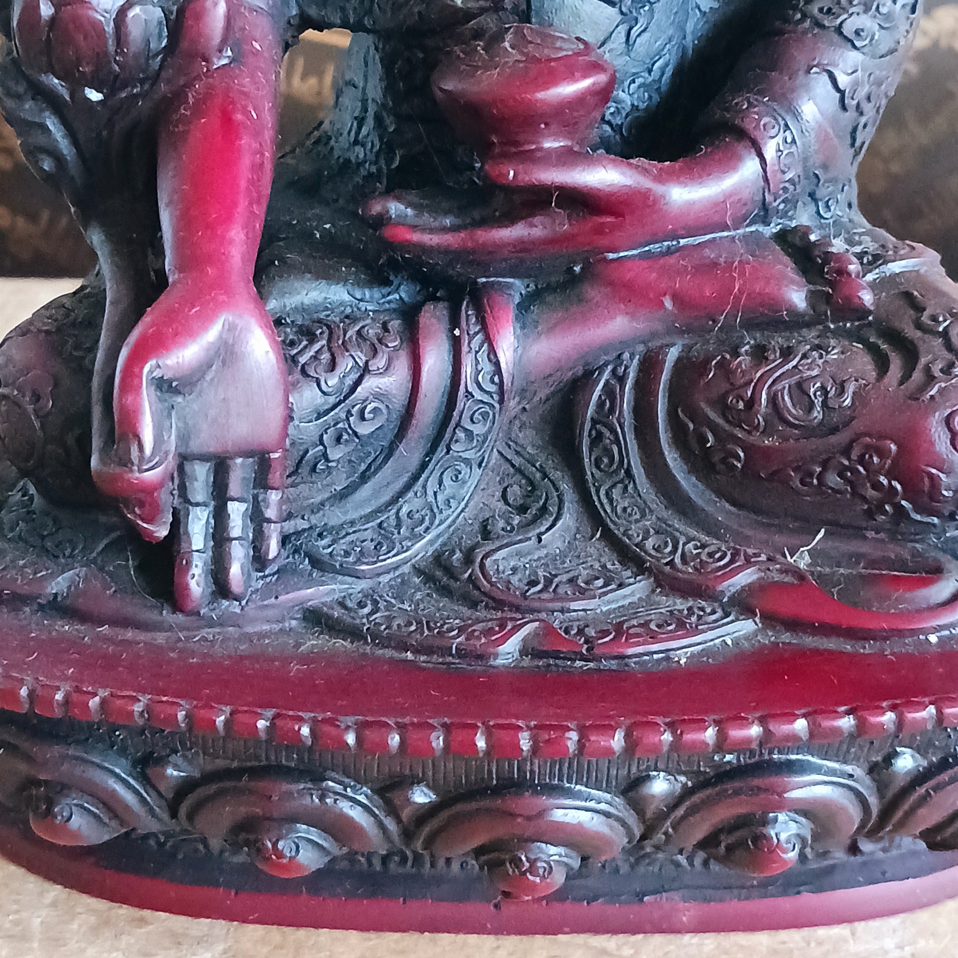 Bring the serene power of healing into your space with this large Medicine Buddha statue. Crafted in a deep, rich red colour with intricate detailing, this sculpture represents Bhaisajya Tathagatta, also known as the Healing Buddha.