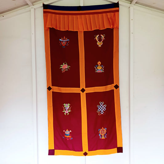 Bring harmony, beauty, and traditional craftsmanship into your space with this hand-embroidered Tibetan Buddhist door curtain, adorned with the sacred Eight Auspicious Symbols, also known as The Eight Jewels. Each symbol is intricately stitched to represent blessings of prosperity, protection, wisdom, and spiritual awakening.