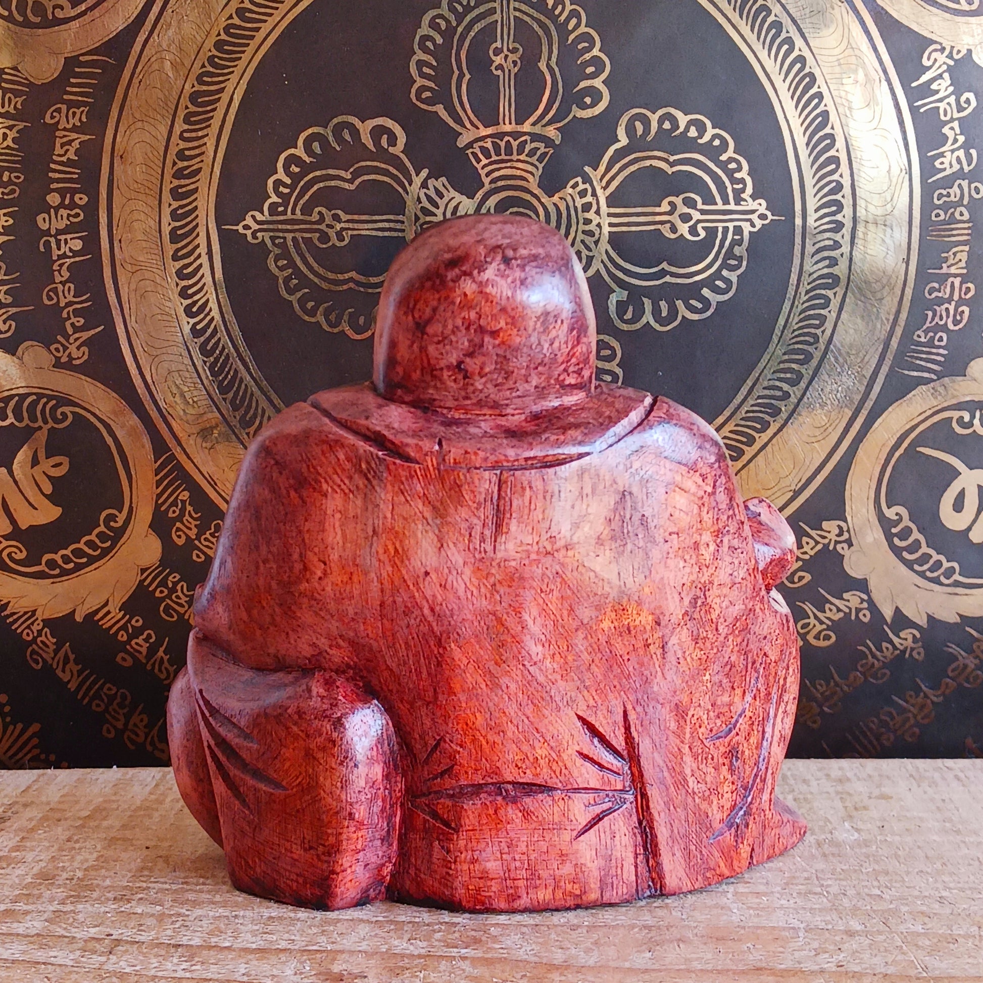Bring joy and good fortune into your space with this exquisite hand-carved Laughing Buddha statue. Known as Budai in Chinese culture, this beloved figure represents contentment, abundance, and spiritual well-being.