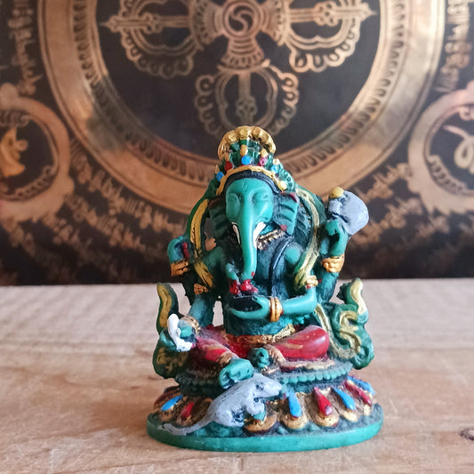 Bring the wisdom and prosperity of Lord Ganesh into your home with this intricately hand-painted resin figurine. Known as the remover of obstacles and the patron of arts and sciences, Ganesh is celebrated for his intellect, wisdom, and guidance.