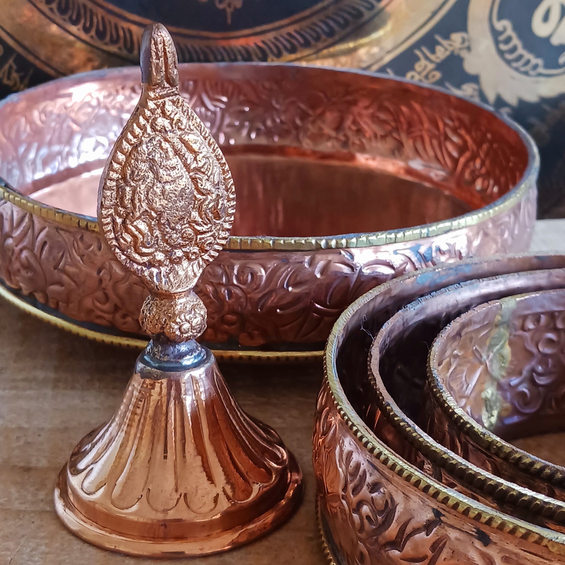Elevate your spiritual practice with this handmade large copper mandala offering set, crafted with traditional Tibetan artistry. In Tibetan Buddhism, offering a mandala symbolizes offering the entire universe—mountains, continents, precious substances, and realms—to the enlightened beings. Through this profound practice, one accumulates merit, wisdom, and spiritual clarity.