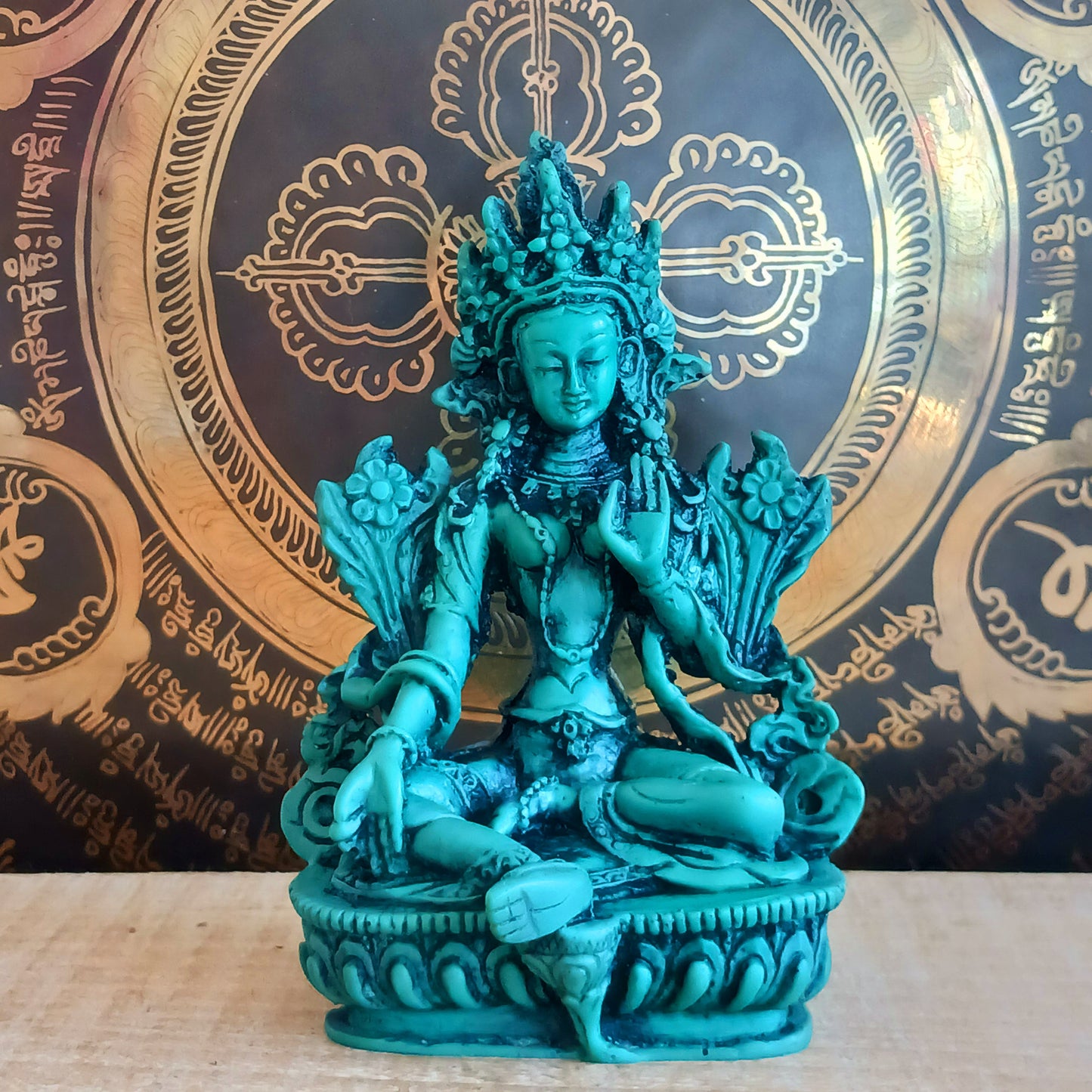 Bold green resin Green Tara statue with symbolic mudras. A powerful spiritual accent for home, altar, or gift.