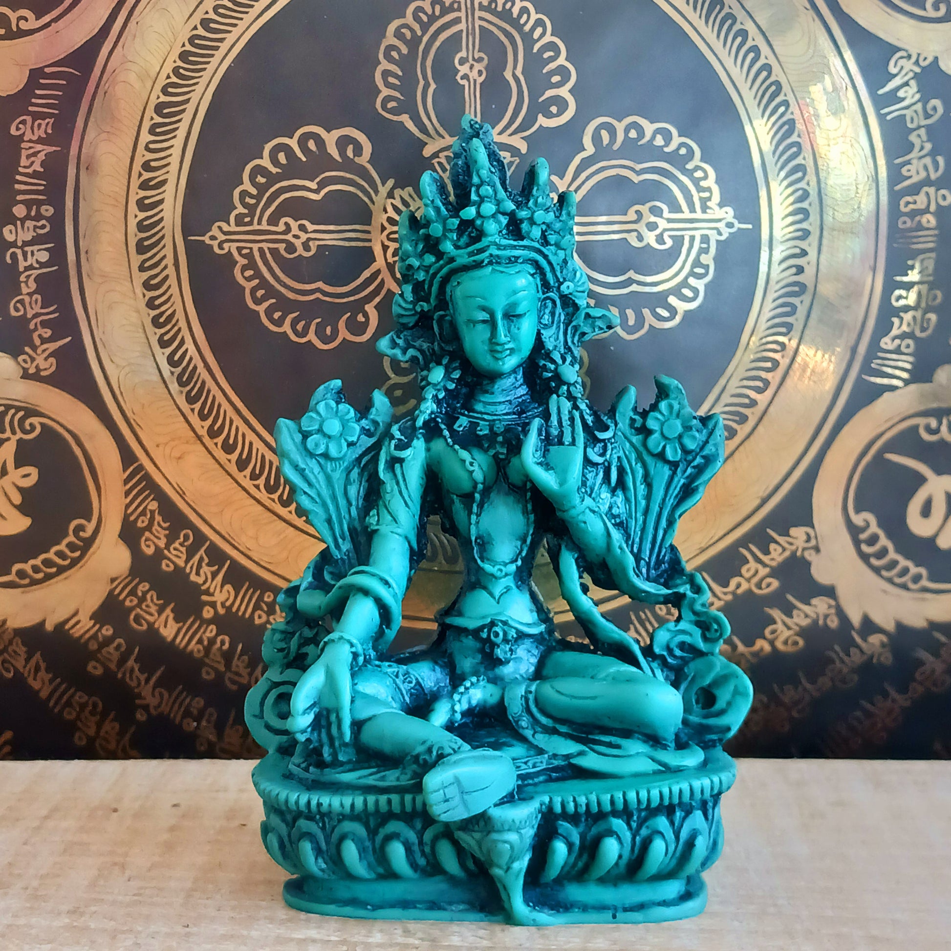 Bold green resin Green Tara statue with symbolic mudras. A powerful spiritual accent for home, altar, or gift.