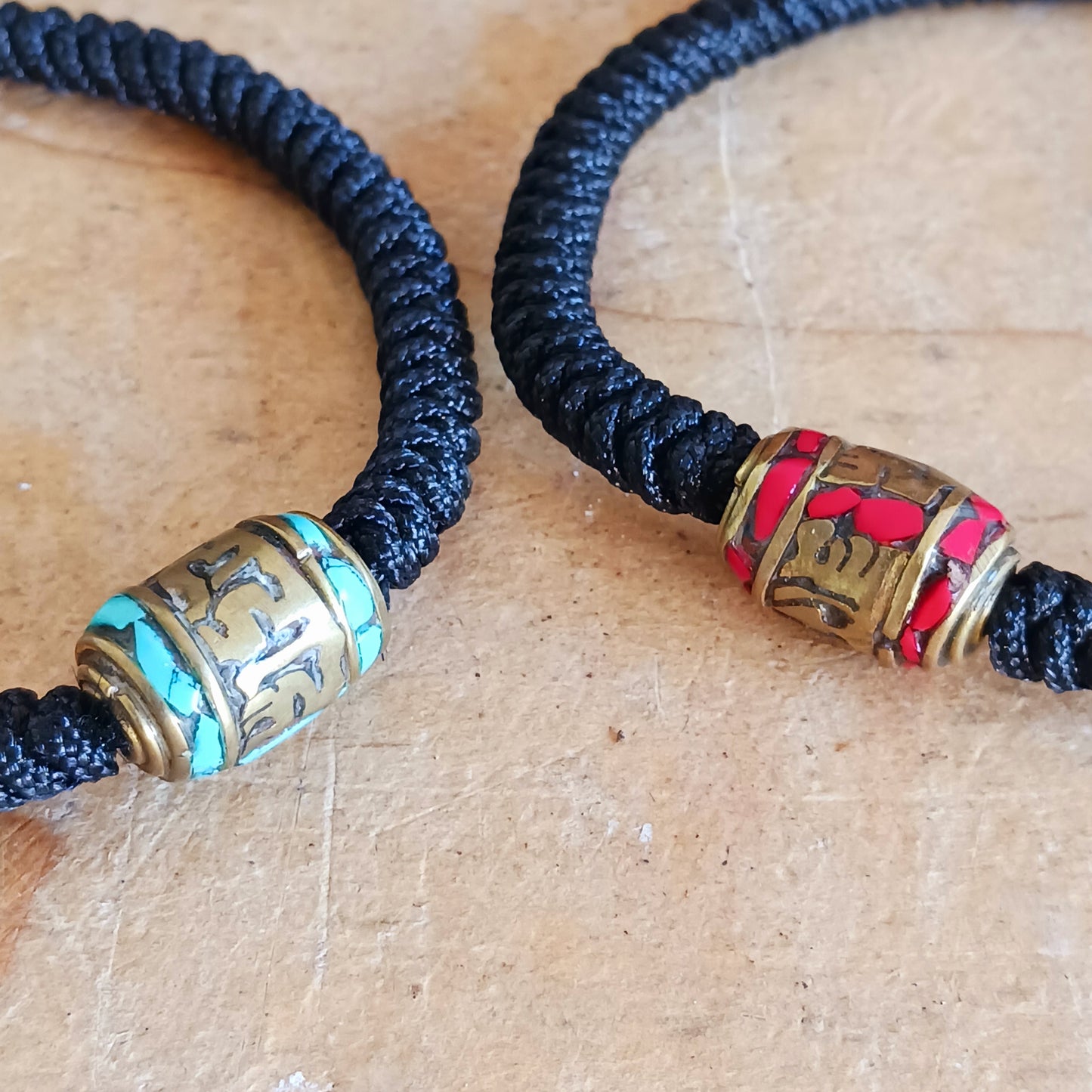 Experience the timeless beauty and spiritual symbolism of this handcrafted Tibetan Mantra Rope Bracelet. Each bracelet is skilfully woven with high-quality braided cord, designed to be durable, lightweight, and comfortable for daily wear.