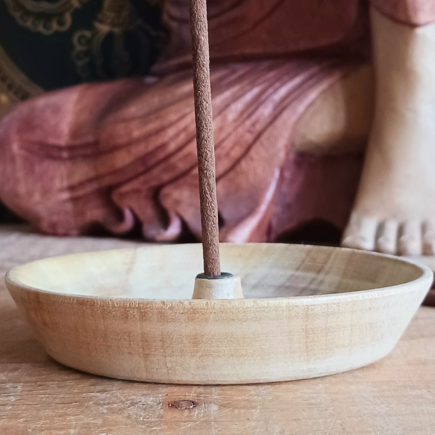 Bring a touch of Himalayan craftsmanship into your space with this beautifully hand-carved incense holder, crafted from a single piece of yellow wood sourced in Nepal. Each piece is skilfully shaped by local artisans, giving it its own natural character and charm.