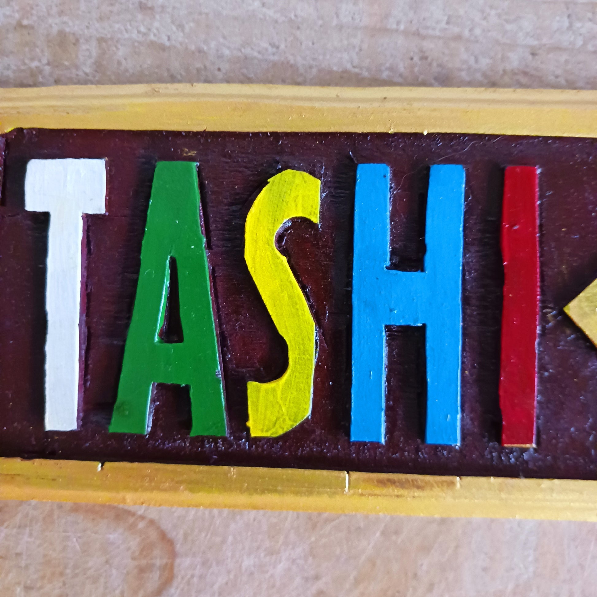 Tashi means auspicious and delek means fine or well. Tashi delek also means good luck, hello and blessings. Tashi Delek is used in greeting, congratulation, and good-luck wishes. It is also used in Bhutan and in North East India in the same way.