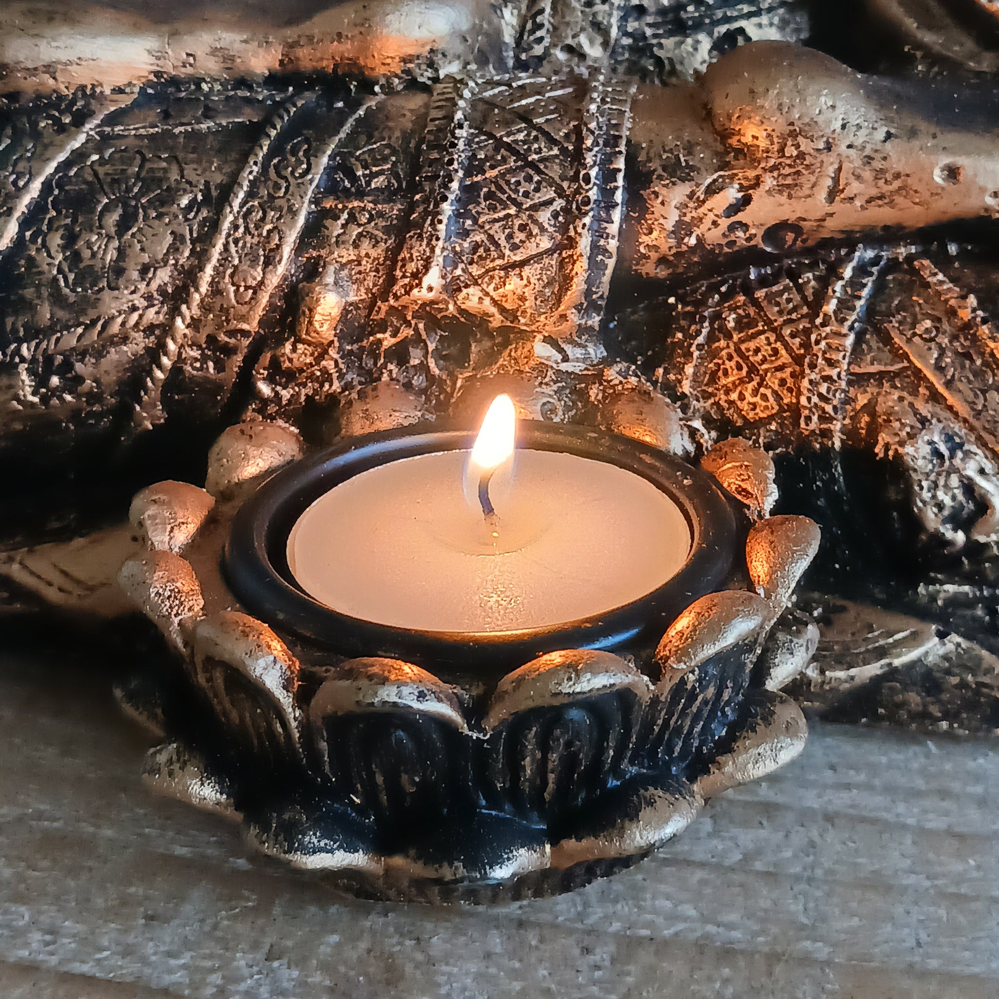 Bring a sense of calm and harmony to any space with this stunning Gold Effect Thai Buddha Tealight Holder. Crafted with beautiful detailing, this serene Buddha sits in a peaceful meditating pose while gently cradling a space for a tealight.