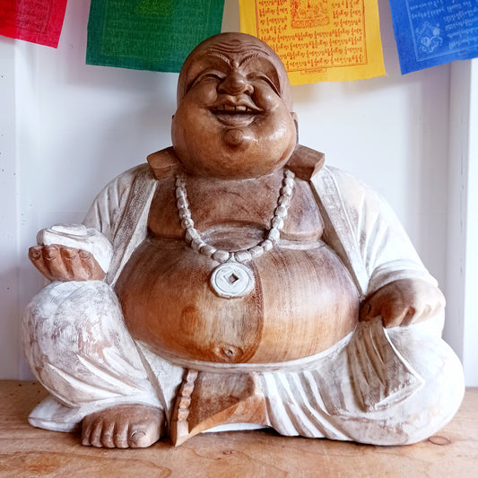 Bring warmth, joy, and calm into your space with this stunning Large Hand-Carved Happy Buddha Statue. Each piece is patiently sculpted by skilled artisans using traditional tools, a process that can take weeks and gives every curve and detail its distinctive character.