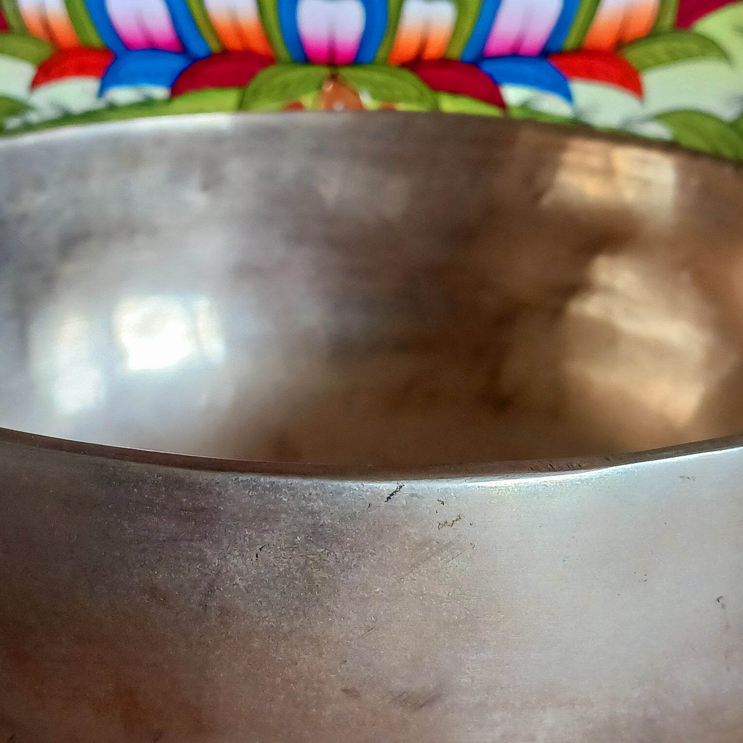 Elevate your meditation and sound healing practice with this Classic Hand-Hammered Singing Bowl, beautifully engraved with the sacred OHM symbol inside the bowl. This is a unique, one-of-a-kind item—you will receive exactly the bowl pictured.