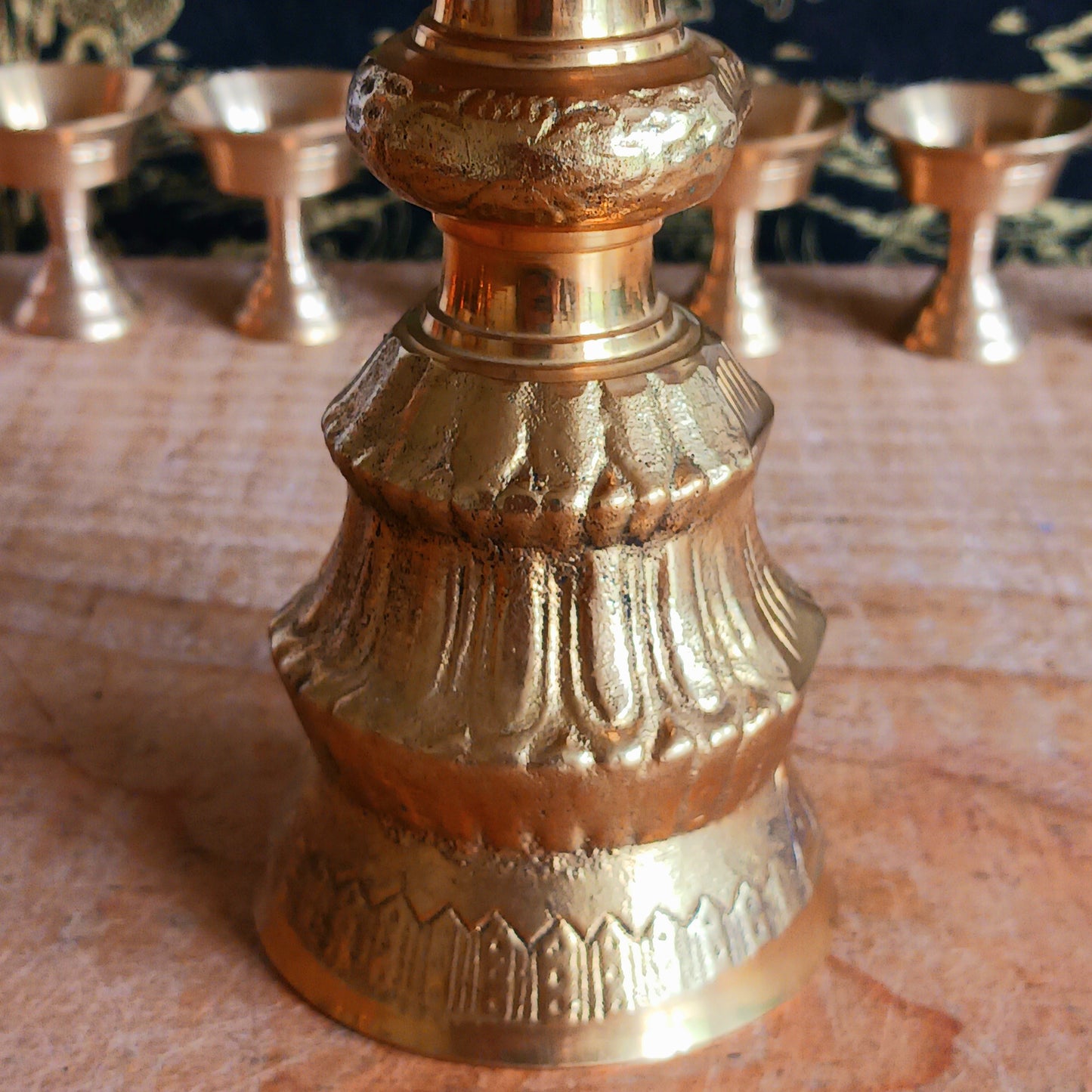 Made from durable brass, the butter lamp emits a warm, soothing glow—ideal for enhancing meditation, prayer, or altar settings. Its two-piece design features a convenient screw mechanism, making it easy to clean and store. A symbol of devotion and cultural heritage, this lamp adds authenticity and serenity to any spiritual practice.