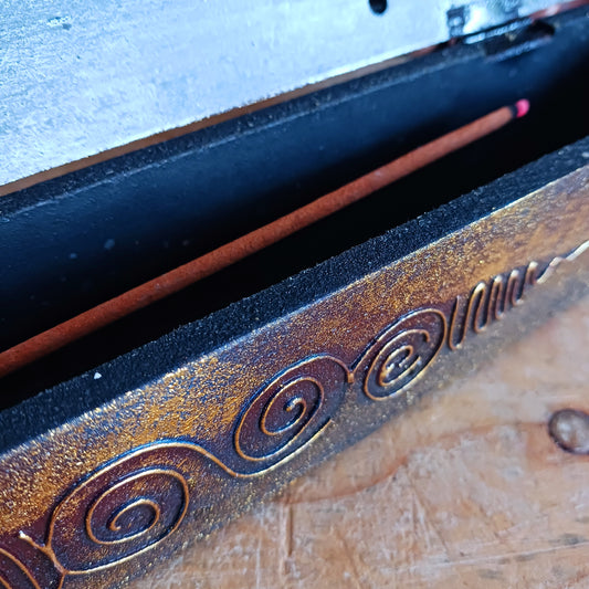 Create a calm, aromatic atmosphere in your home with this beautifully handcrafted OM incense holder. Made from responsibly sourced wood, this unique piece features a delicately hand-carved OM symbol, making it both a functional incense burner and a decorative spiritual accent.