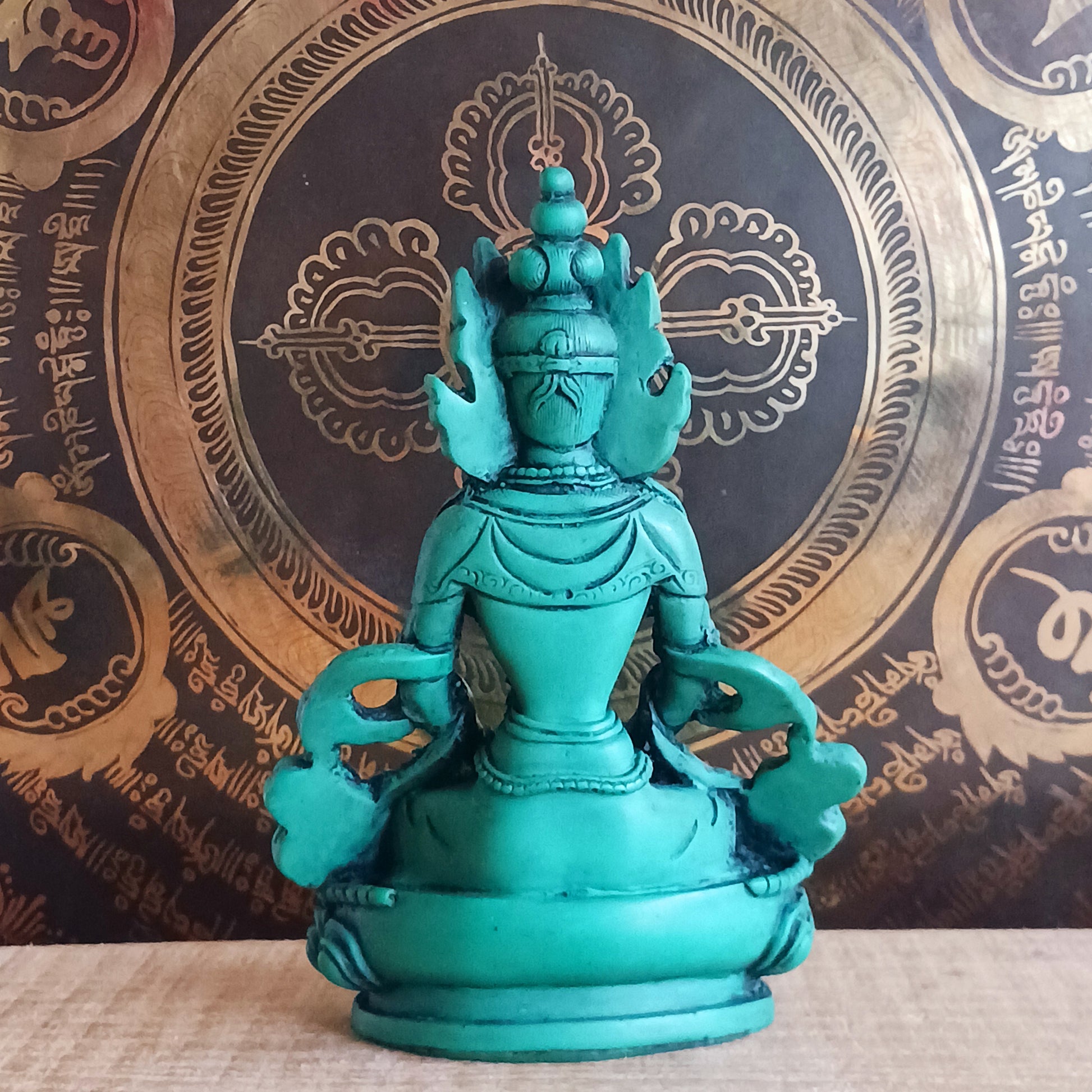 White Tara is known for compassion, long life, healing and serenity and is shown here with her right hand in the varada mudra (blessing pose.) White Tara is distinct from the more commonly seen Green Tara. She is seated in a tranquil, full lotus position as opposed to Green Tara's one foot extended pose. These intricate resin statues are carefully handcrafted in Nepal.