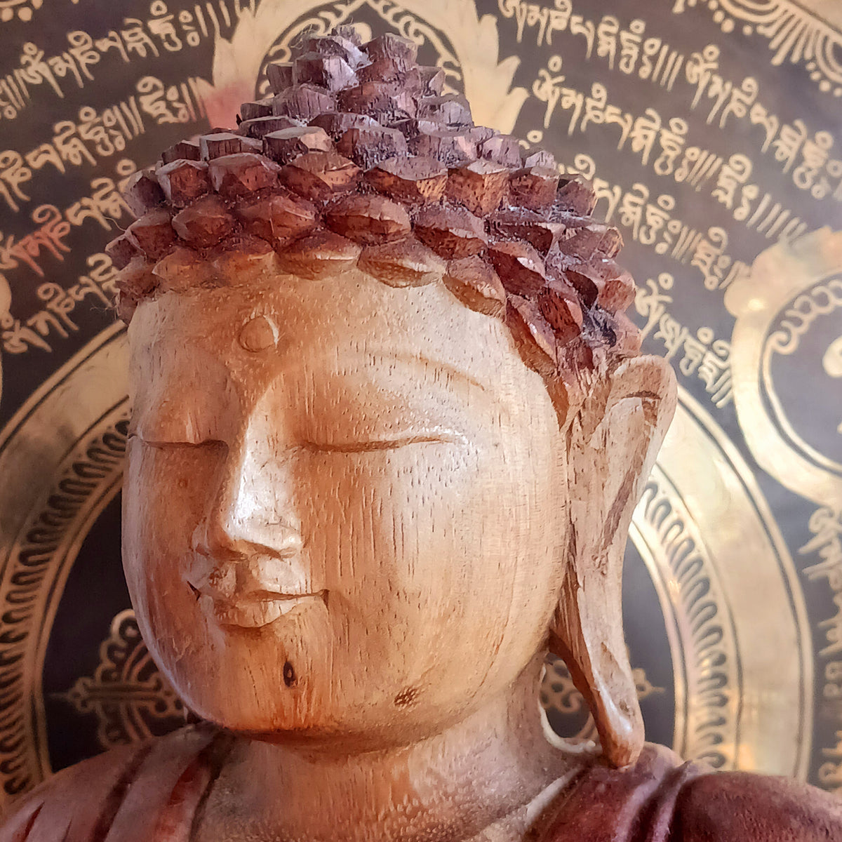 Bring a sense of peace, serenity and mindfulness into your home with this beautiful large Hand Carved Wooden Meditating Buddha Statue. Traditionally crafted in Bali from sustainable Suar wood, each statue is a unique work of art, showcasing the natural beauty of the wood and the skill of the artisan.