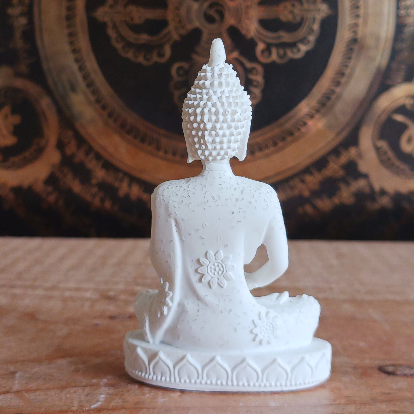 This small white serene Buddha statue is with meditation mudra. &nbsp;Bring peace and calm to your space with this elegant little Buddha statue. Crafted with attention to detail, this serene figurine features the Buddha in a traditional meditation mudra, symbolizing inner peace,