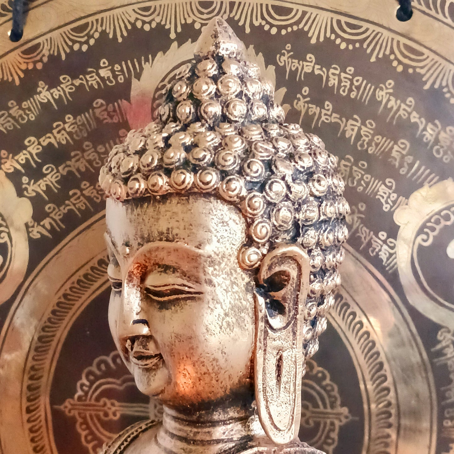 Bring a sense of calm and harmony to any space with this stunning Gold Effect Thai Buddha Tealight Holder. Crafted with beautiful detailing, this serene Buddha sits in a peaceful meditating pose while gently cradling a space for a tealight.