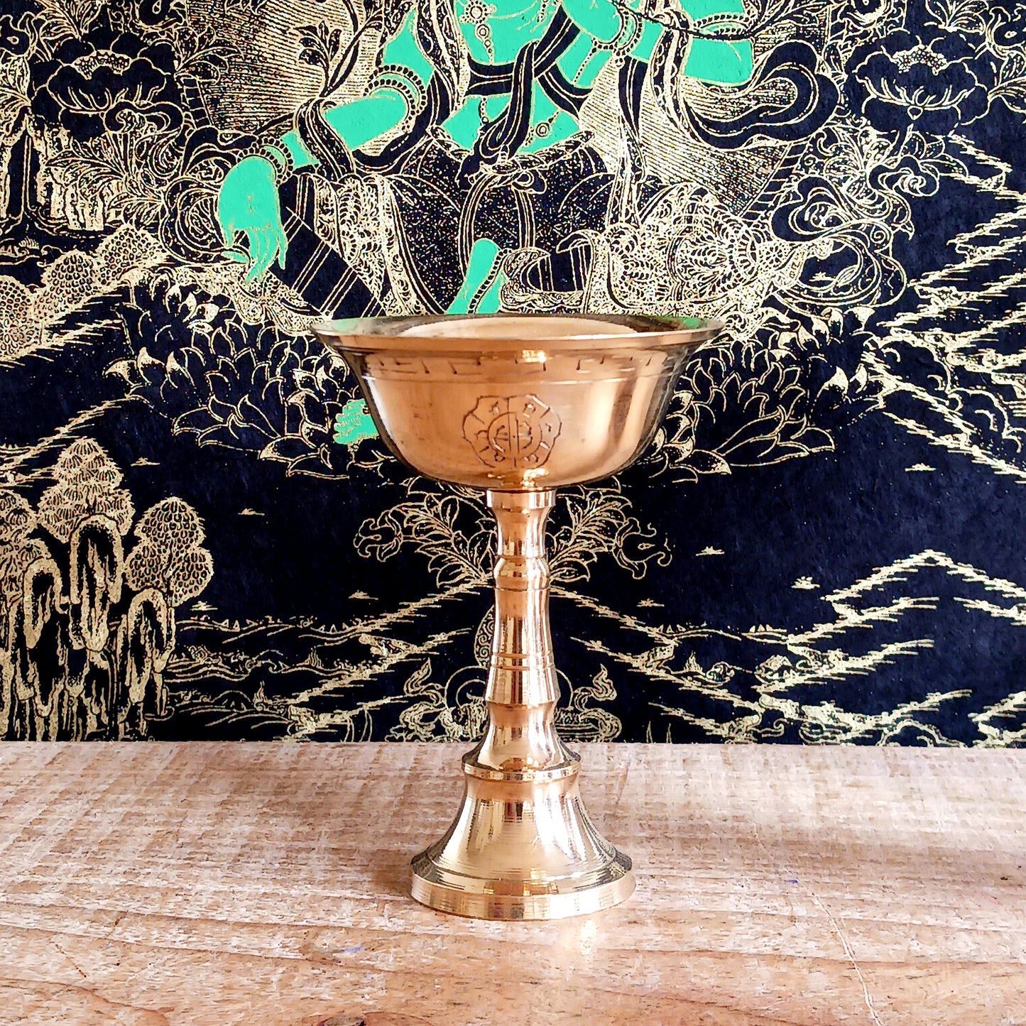 Illuminate your spiritual space with this beautiful Traditional Brass Tibetan Butter Lamp, a sacred symbol used across Himalayan temples and homes. These simple lamps are a cornerstone of Tibetan Buddhist practice, traditionally lit each morning to represent the illumination of wisdom and to dispel ignorance.