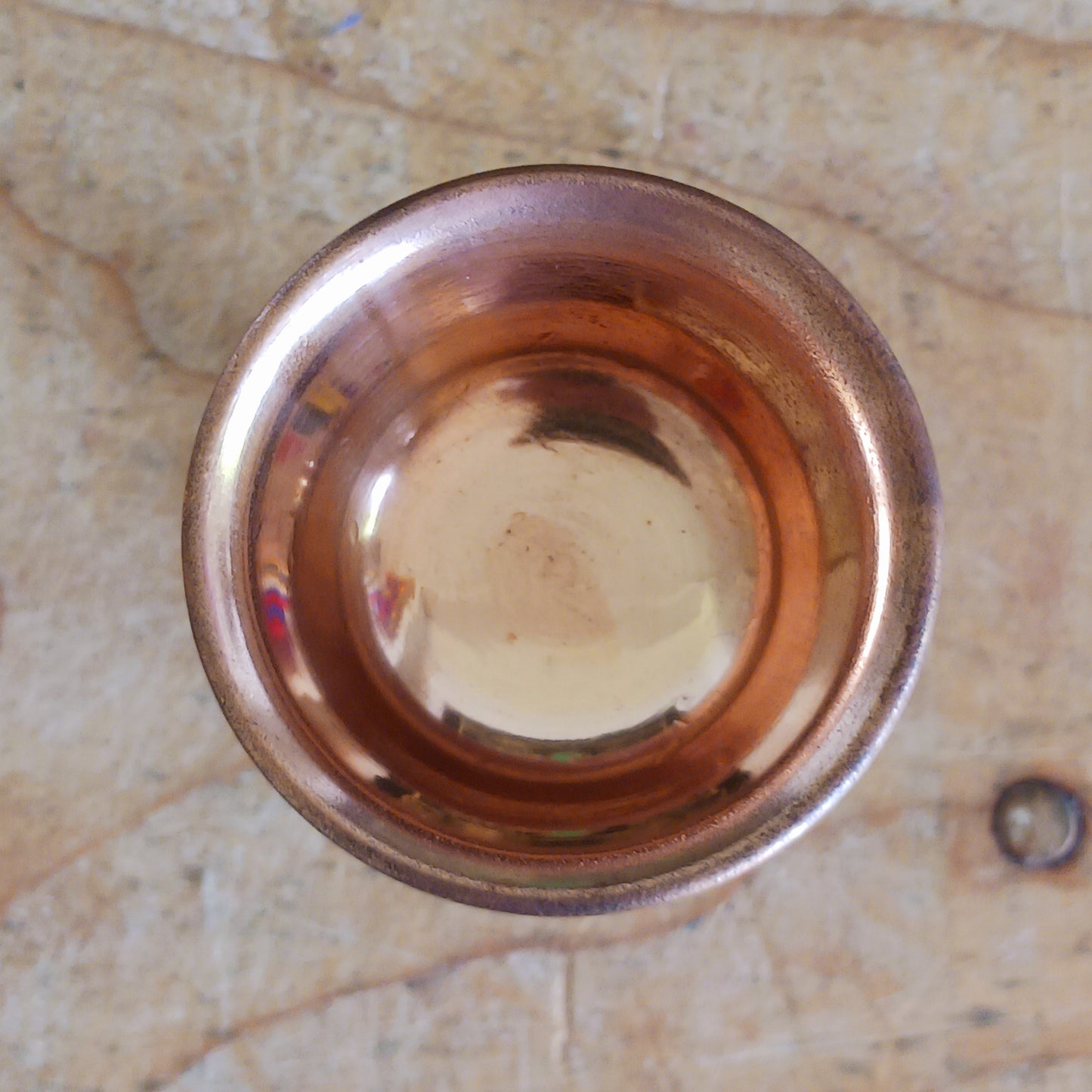 Illuminate your spiritual practice with this fine Traditional Tibetan Butter Lamp, handcrafted from high-quality copper.&nbsp;These sacred lamps are a central element in Tibetan Buddhist rituals, symbolizing the light of wisdom dispelling the darkness of ignorance. Commonly found in Himalayan temples and monasteries, butter lamps are offered each morning by Tibetan Buddhists.