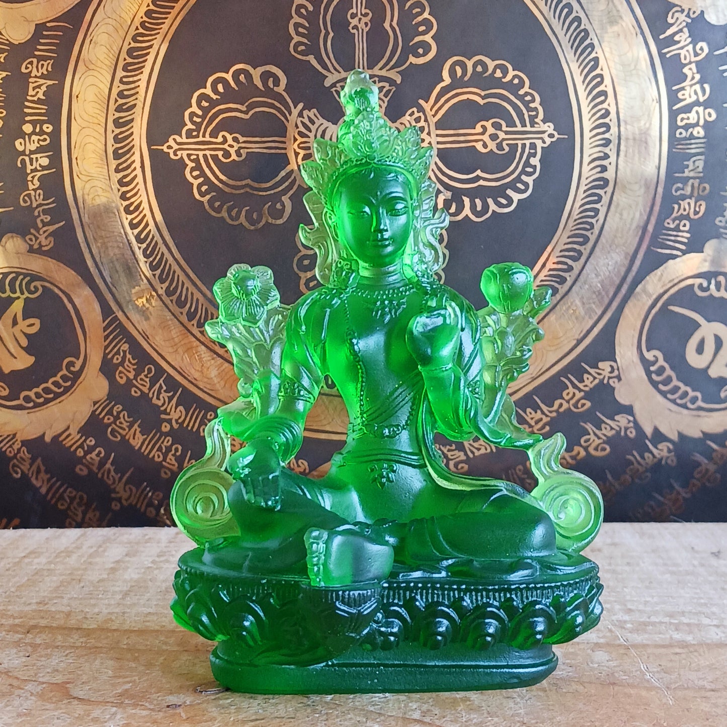 Bring serenity and divine feminine energy into your space with this stunning transparent Green Tara statue, crafted from high-quality glazed glass. Known as the "Mother of all Mothers," Green Tara represents compassion in action. Her graceful posture—one leg extended—symbolizes her readiness to help all beings instantly.