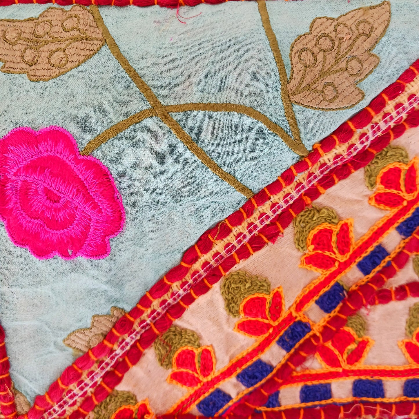 This long and beautifully intricate Indian Toran has been handmade from patches of vintage fabrics, wedding saris and recycled fabrics.  It will be a unique addition to any home and bring vibrancy of colour and embellishment.