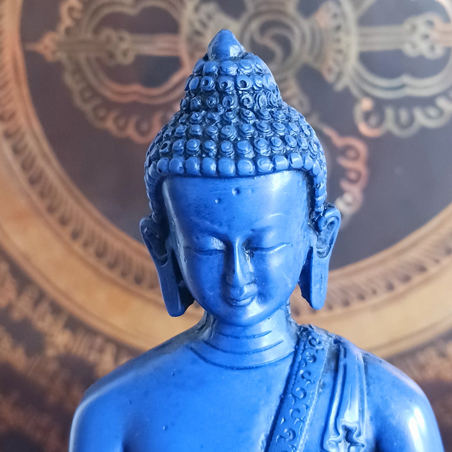 Invite peace, healing, and spiritual balance into your space with this stunning Medicine Buddha (Bhaiṣajyaguru) statue, cast in a radiant, vibrant blue. Revered throughout Mahayana Buddhist traditions, especially in Tibet and East Asia, the Medicine Buddha embodies the power to alleviate physical, emotional, and spiritual suffering.