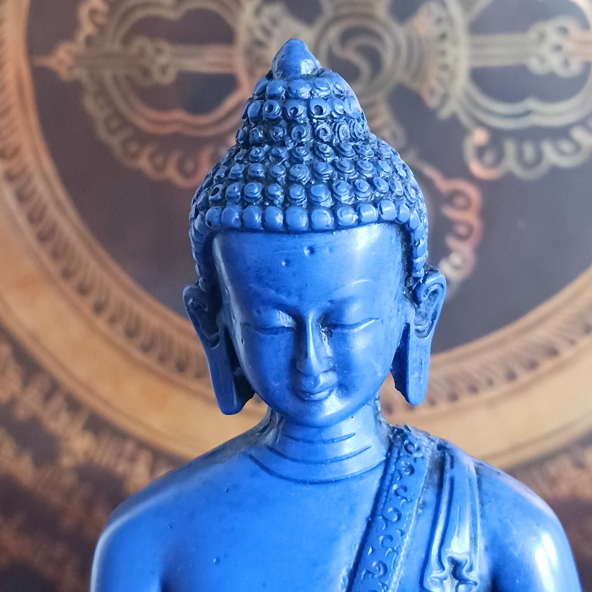 Invite peace, healing, and spiritual balance into your space with this stunning Medicine Buddha (Bhaiṣajyaguru) statue, cast in a radiant, vibrant blue. Revered throughout Mahayana Buddhist traditions, especially in Tibet and East Asia, the Medicine Buddha embodies the power to alleviate physical, emotional, and spiritual suffering.