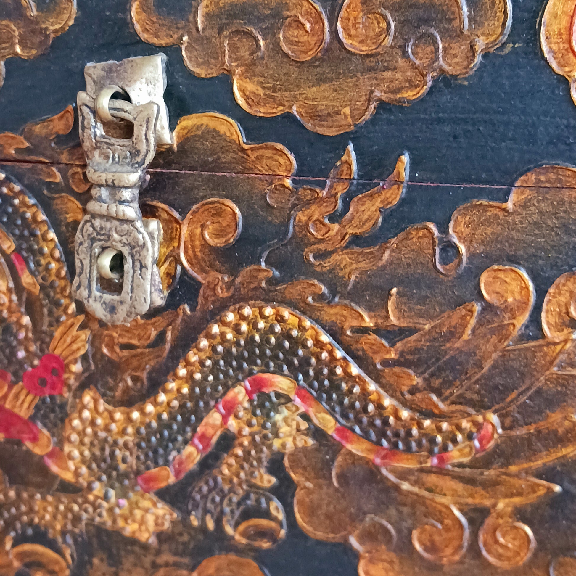 These beautiful hand painted traditional Tibetan treasure box has been carefully handcrafted in Kathmandu, Nepal by a small group of Tibetan artists. The boxes are hand painted with a dragon motif on the front, Yin Yang and Eternal Knot designs on the top in black, gold and red paint.