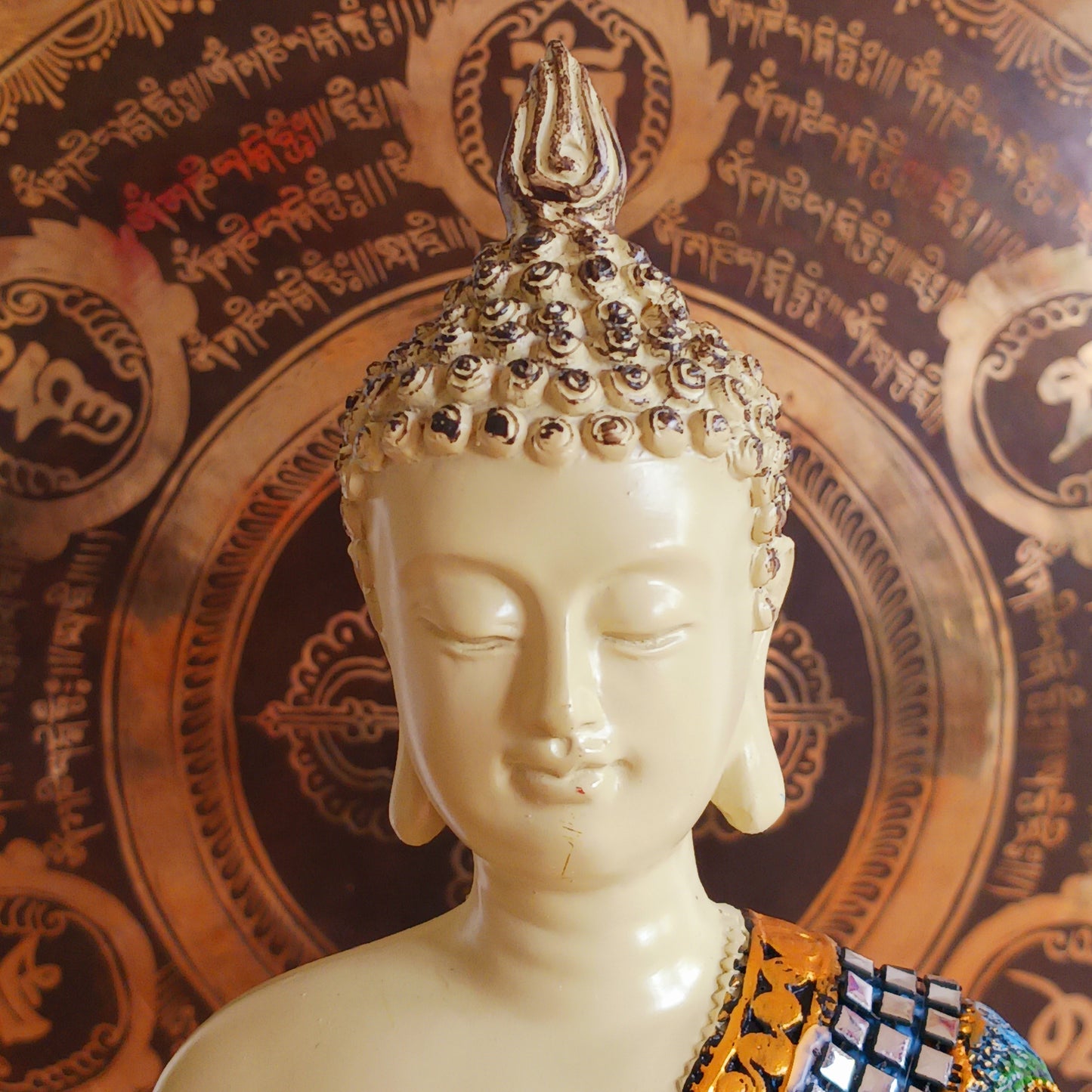 Bring serenity and elegance to your space with this meditating Thai-Style Buddha statue. Standing 29 cm tall, it is beautifully crafted from durable Poly Resin and features a shimmering Mirror inlay that reflects light and grace in every detail. Perfect for home decor, meditation spaces, or as a meaningful gift, this statue inspires peace and mindfulness wherever it's placed.